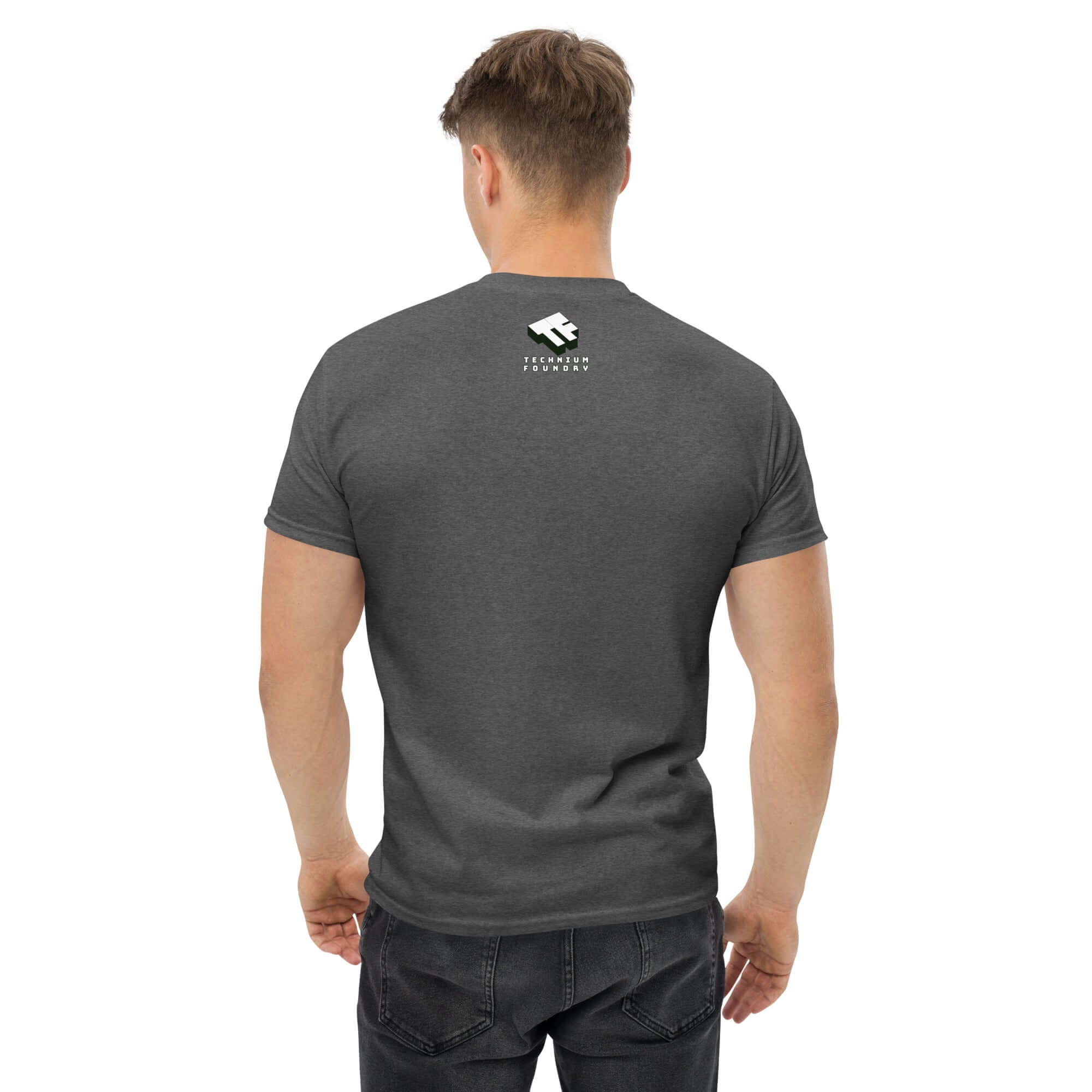 Back view of a man wearing a dark gray t-shirt with a small branded logo near the collar.