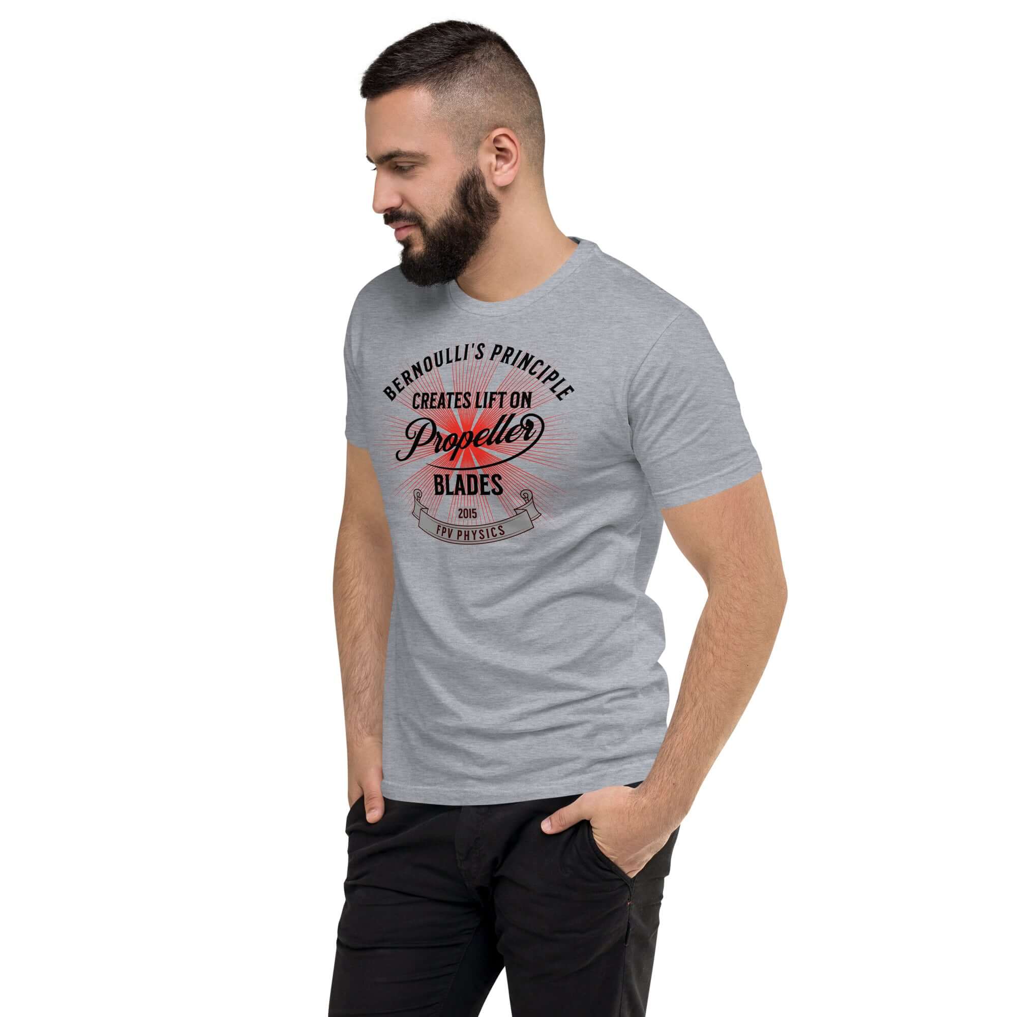 Man wearing a grey t-shirt with 'Bernoulli's Principle Creates Lift on Propeller Blades' design, ideal for drone technology enthusiasts.