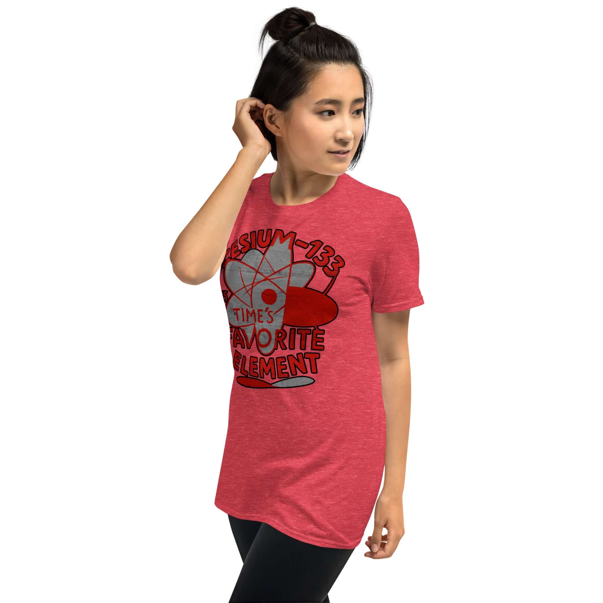 Woman wearing red Cesium-133 Atomic Clock T-Shirt with a circular design, highlighting time's favorite element for precision.