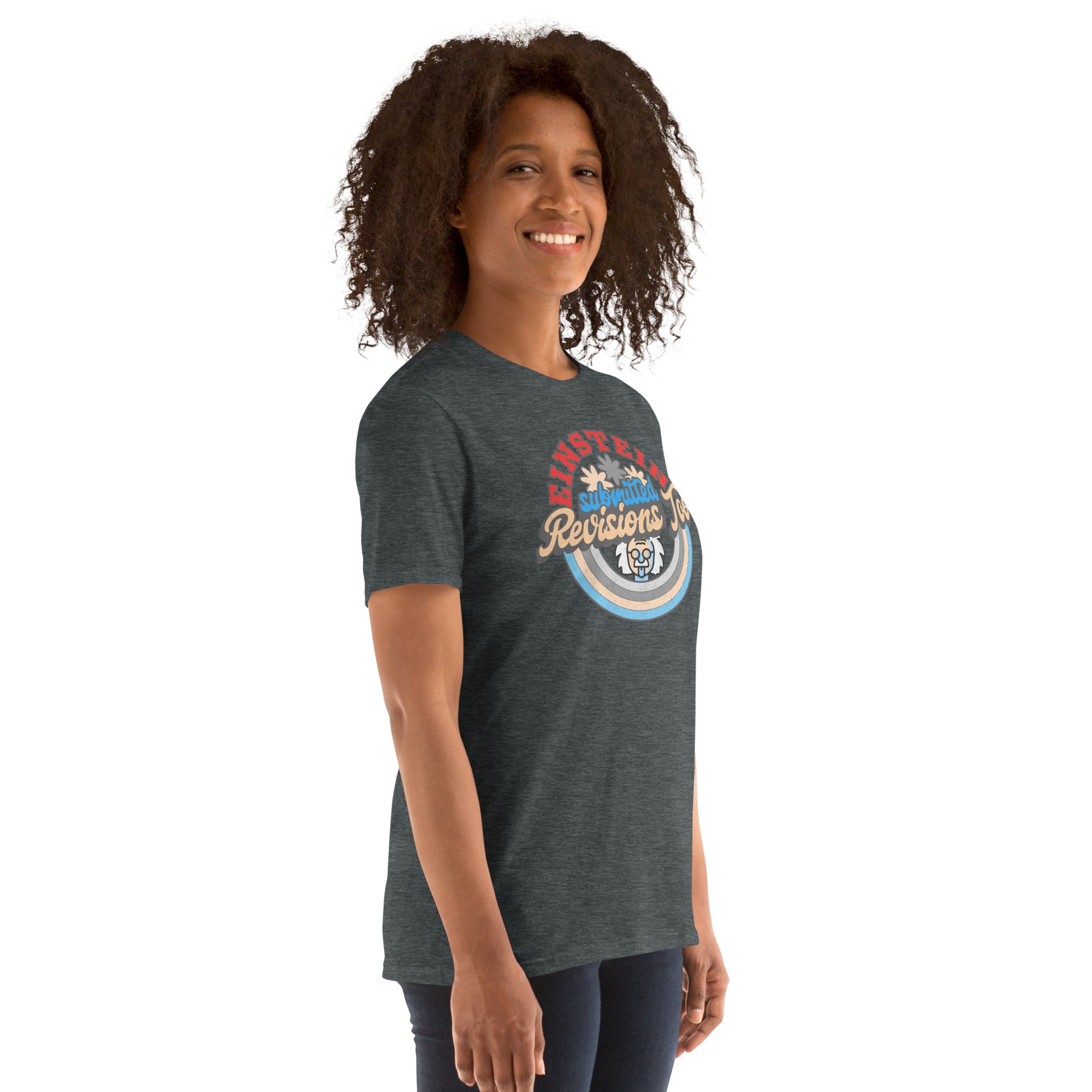 Woman wearing Einstein Submitted Revisions Too T-shirt with retro design, featuring cartoon Einstein, rainbows, and flowers.