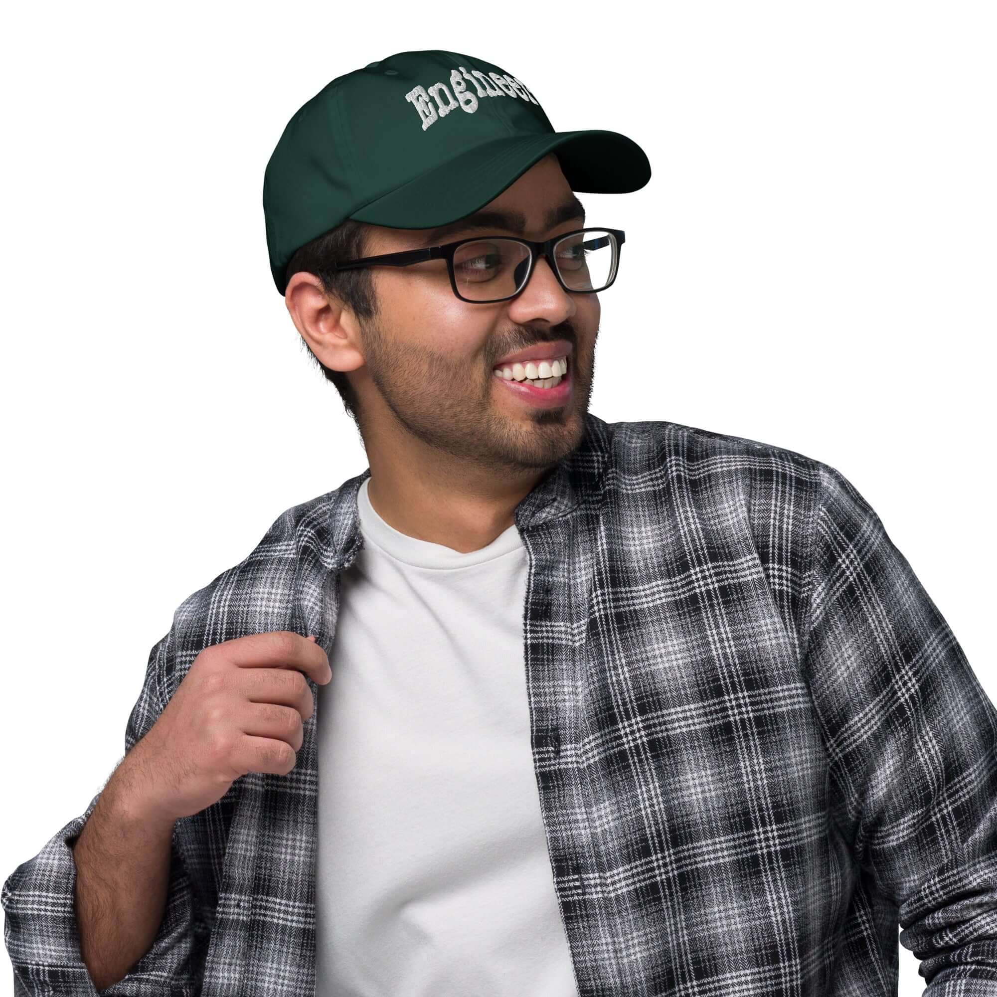 Dynamic engineer wearing a sleek baseball cap, showcasing professional problem-solving style with confidence and flair.