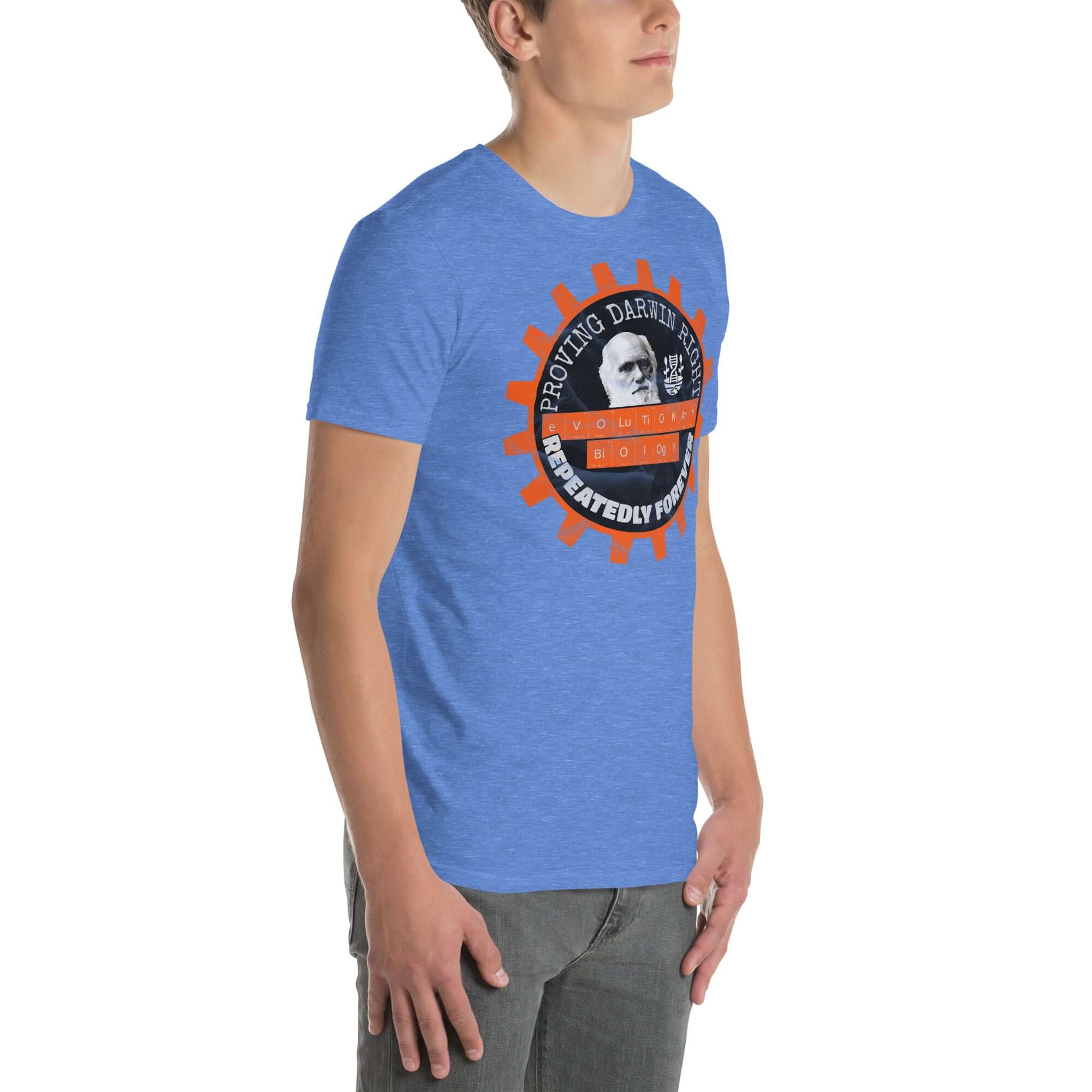 Man wearing blue Evolutionary Biology T-Shirt with 'Proving Darwin Right Repeatedly Forever' design, celebrating natural selection.