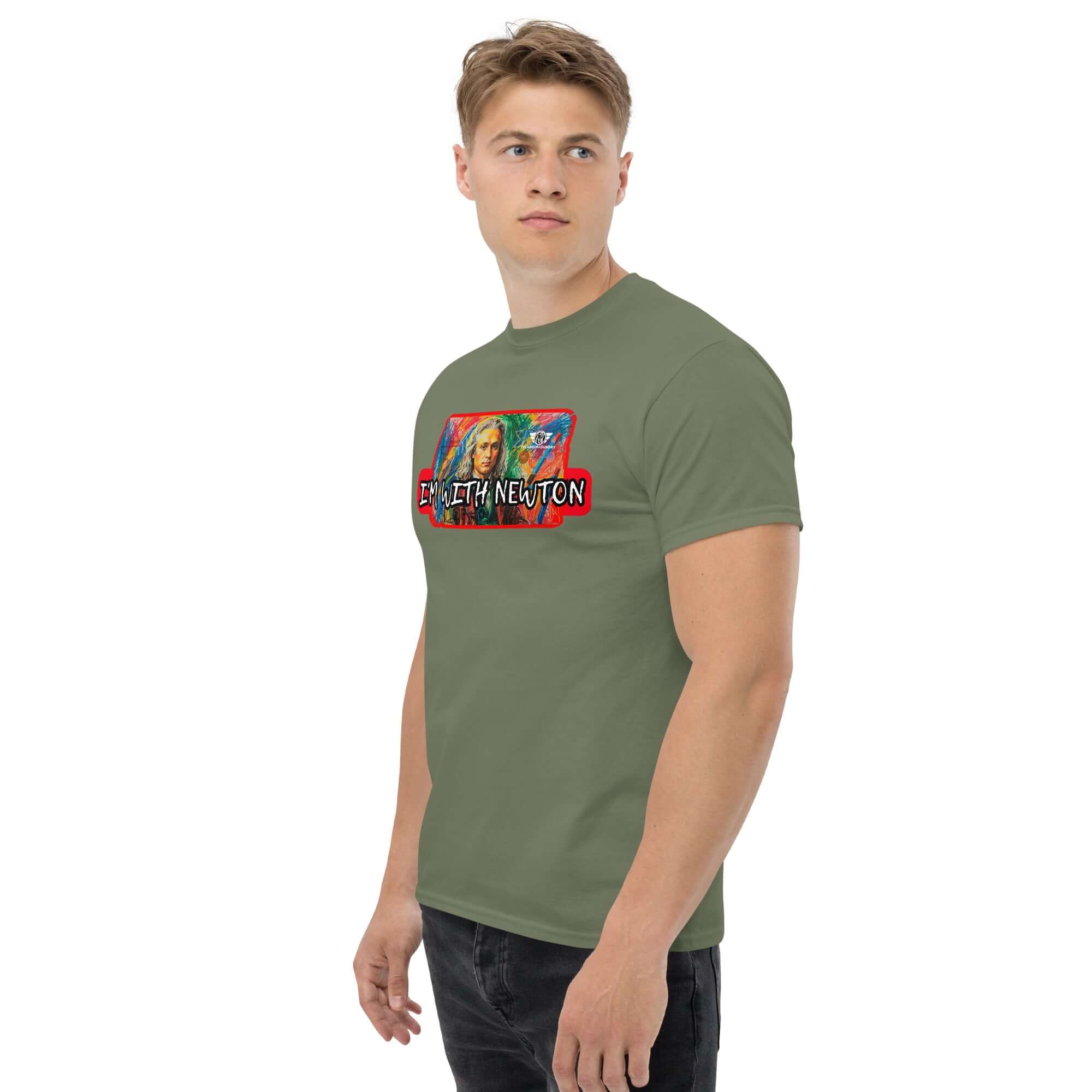 Model wearing 'I'm With Newton' colorful physics pop art T-shirt featuring Sir Isaac Newton on green fabric.