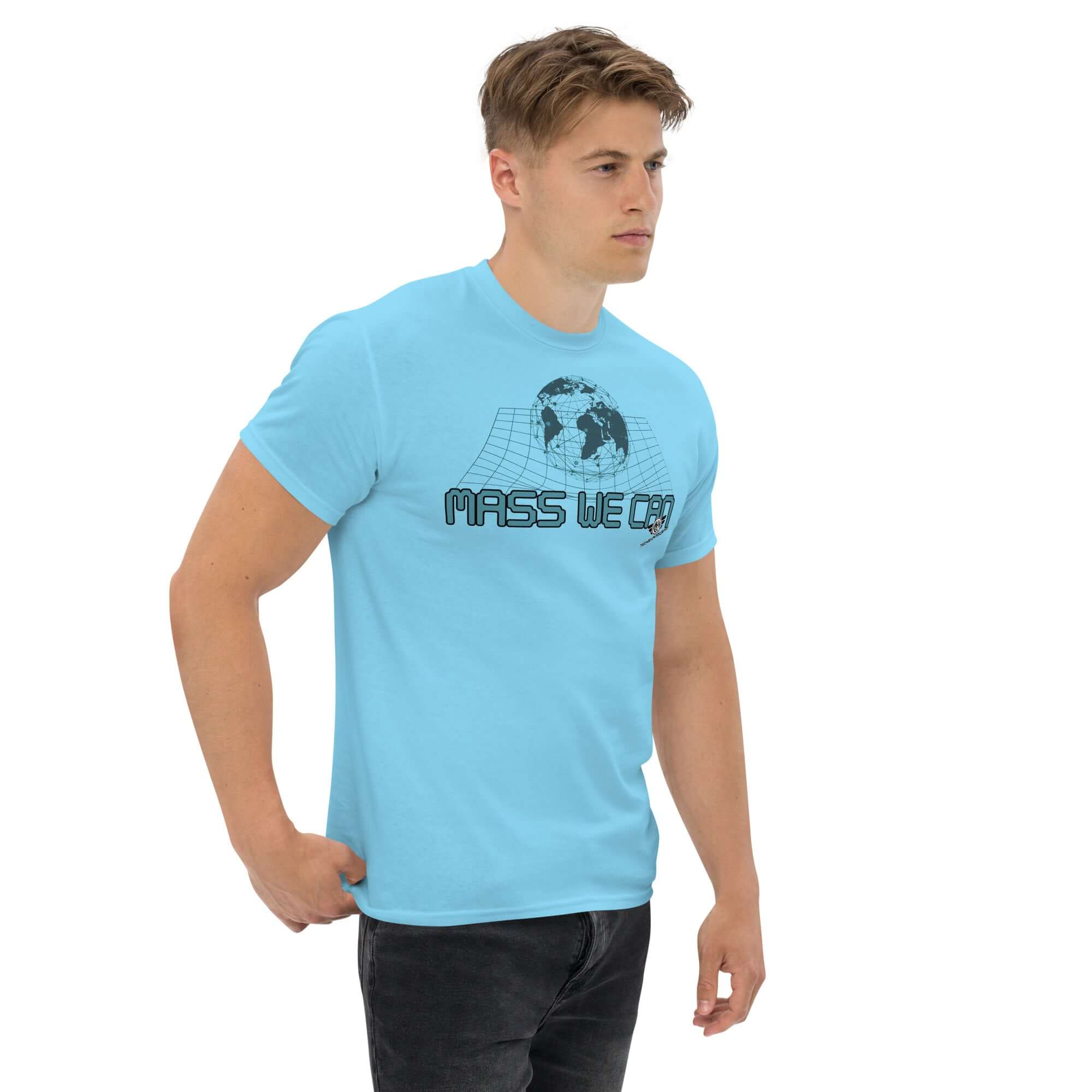 Man wearing 'Mass We Can' t-shirt featuring Einstein's space-time curvature design and humor about gravitational relativity.