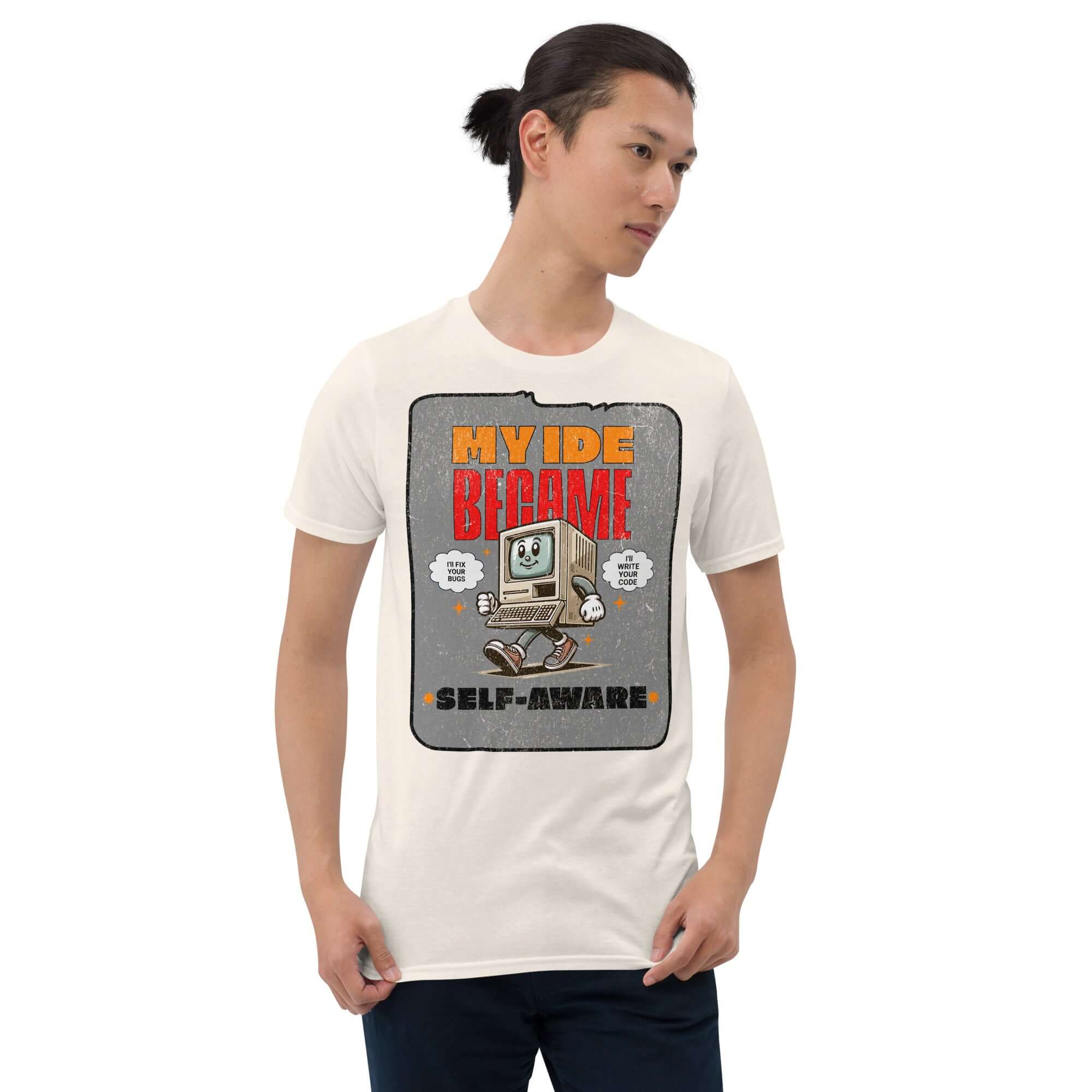 Man wearing 'My IDE Became Self-Aware' T-shirt featuring cute vintage computer AI design; perfect for programmers.