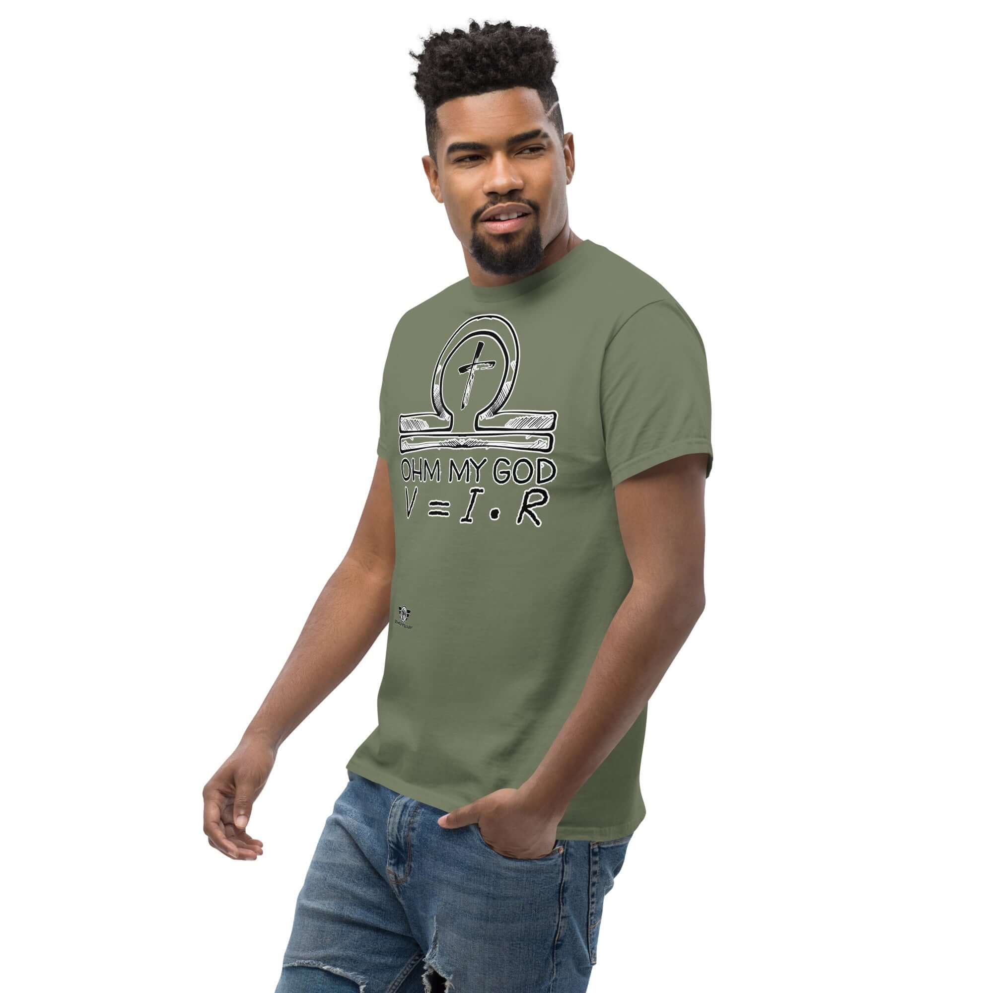 Alt Tag: Man wearing Ohm My God t-shirt featuring ankh and omega symbols with physics formula V=IR, blending religious humor and science.