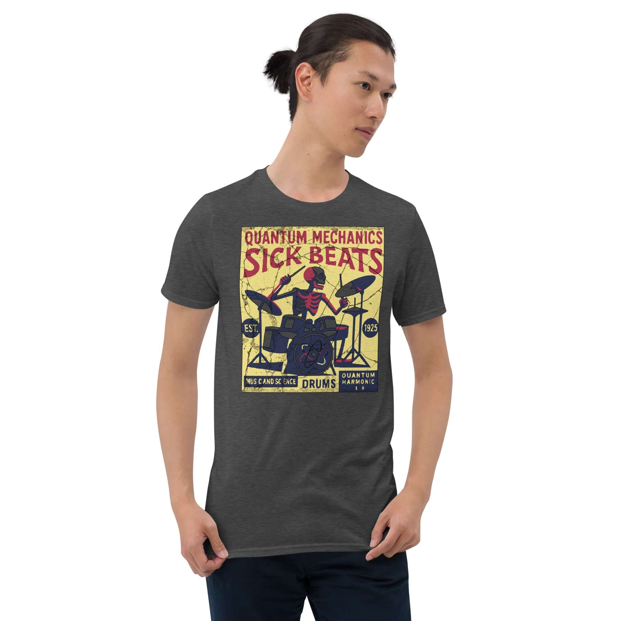Man wearing a Quantum Mechanics Sick Beats T-Shirt with physics drummer design, merging particle physics and percussion.