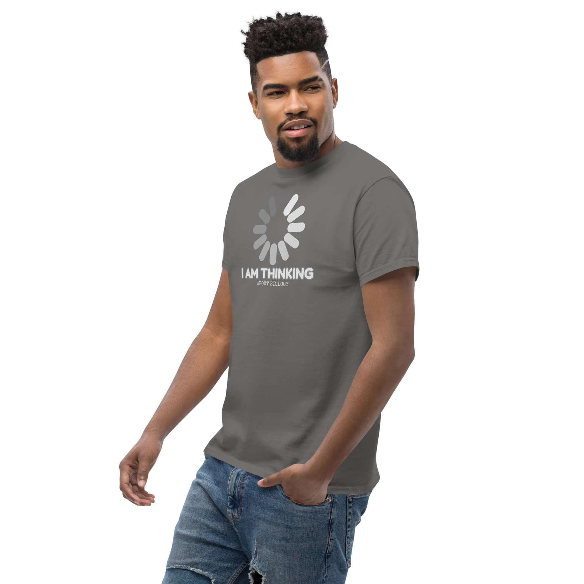 Man wearing gray "I Am Thinking About Biology" loading screen t-shirt, science humor apparel.