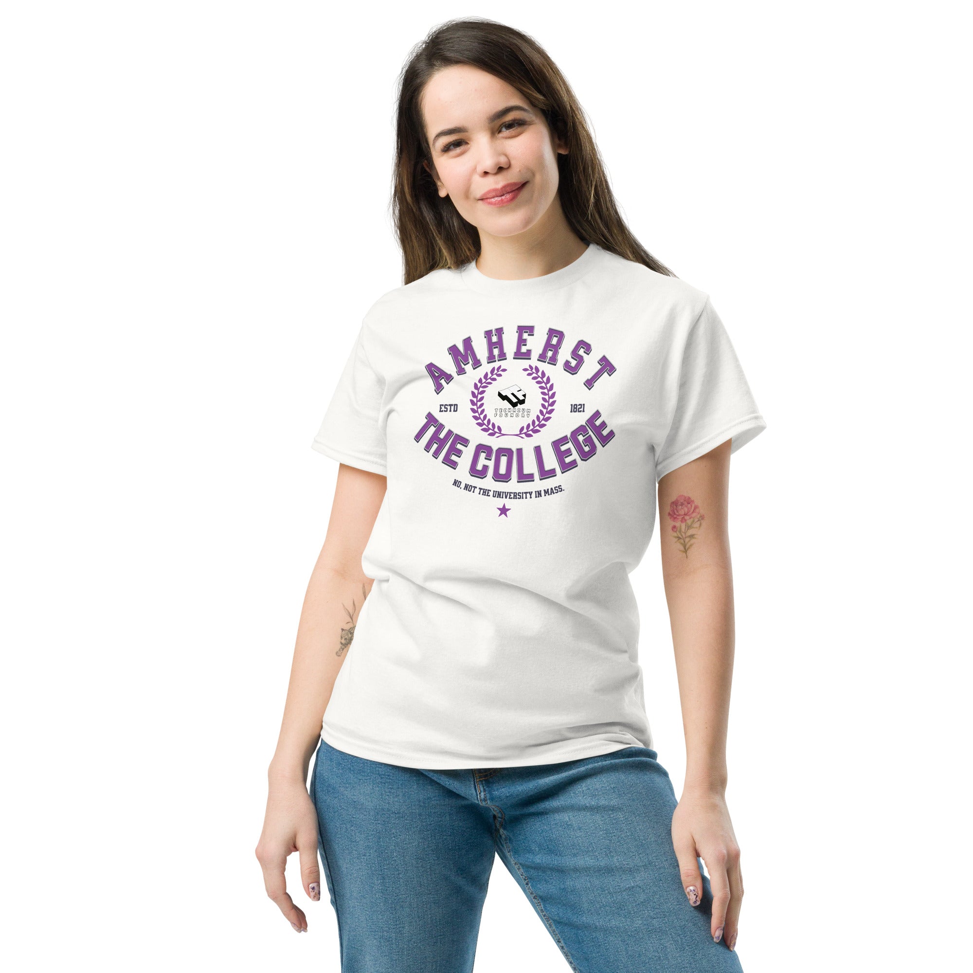 Person wearing Amherst Clarification T-Shirt with "THE COLLEGE" print, highlighting institutional identity in cream color.