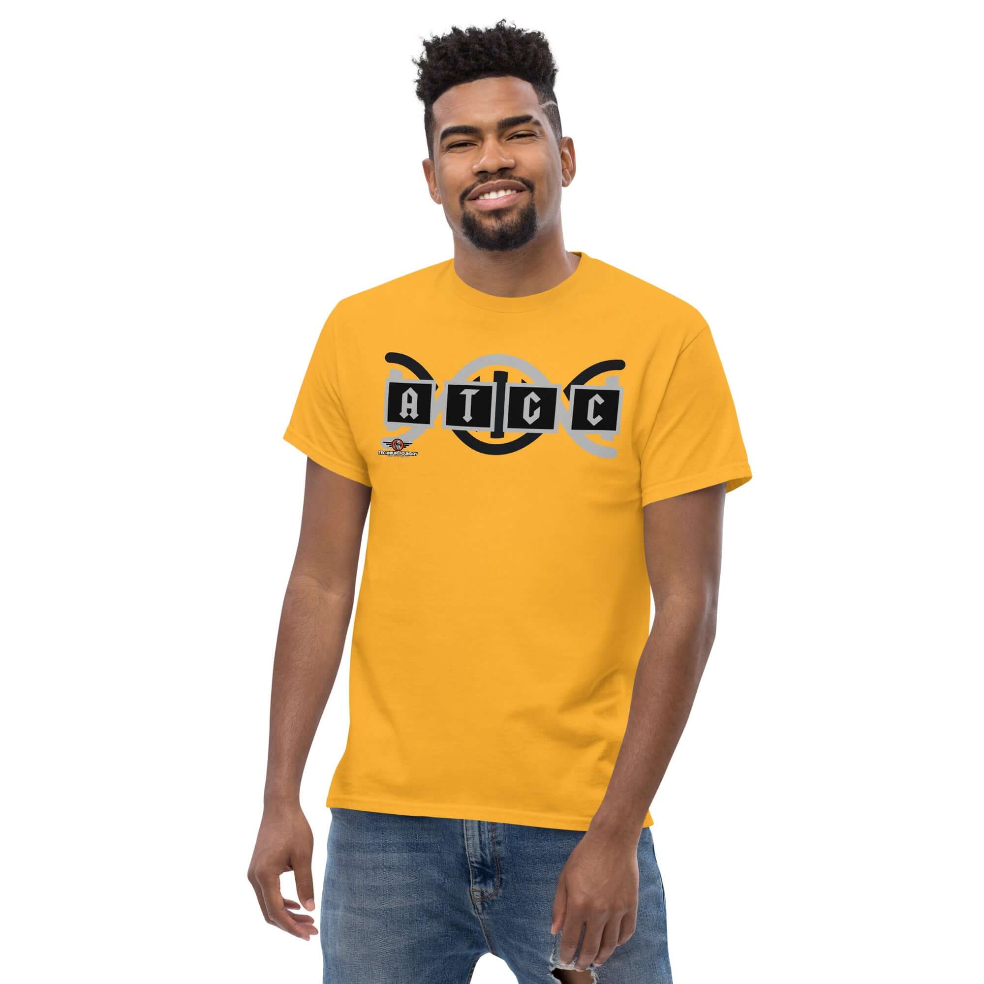 Man wearing AT/GC DNA t-shirt in yellow, featuring heavy metal band style with nucleotide base pairs Adenine-Thymine, Guanine-Cytosine.