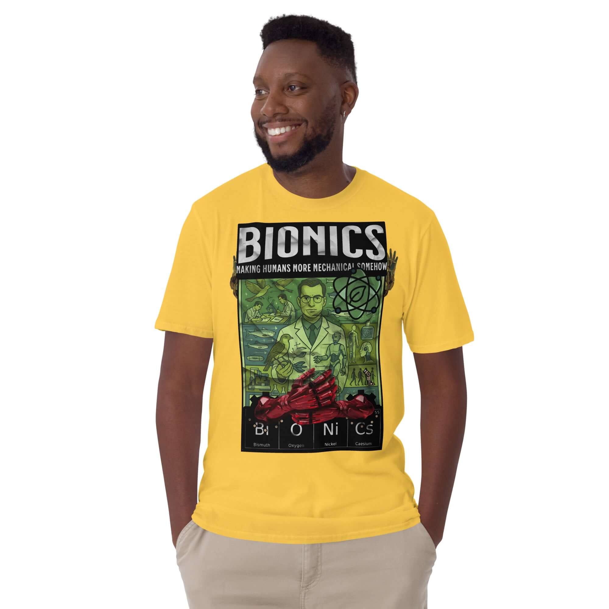 Man wearing yellow Bionics T-shirt with retro scientific poster design promoting human enhancement and bioengineering marvels.