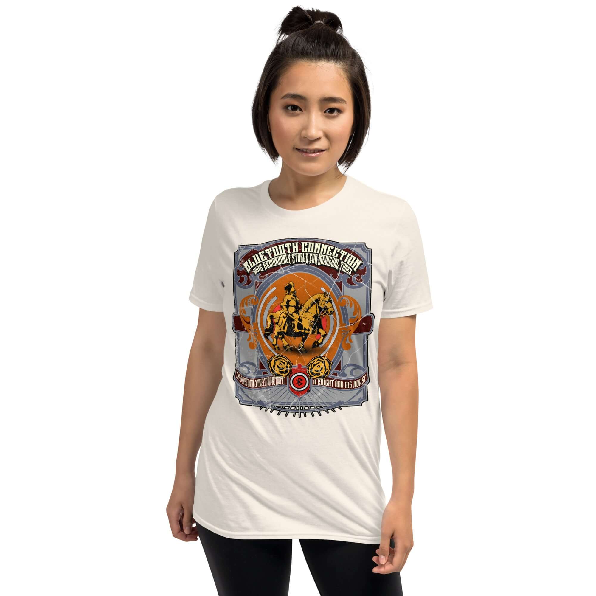 Person wearing a humorous Bluetooth Connection Medieval T-shirt featuring a knight on a horse for tech history enthusiasts.