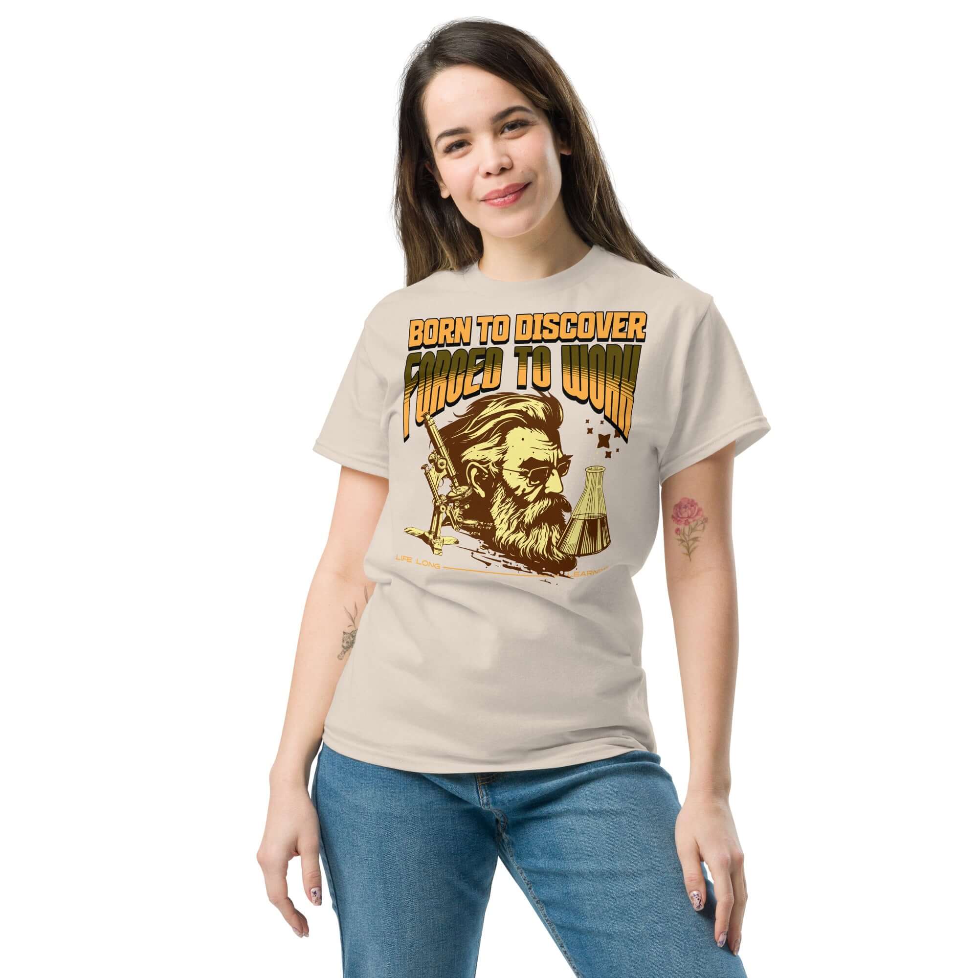 Woman wearing 'Born to Discover, Forced to Work' scientist t-shirt, vintage illustration of bearded scientist. Perfect for academics.