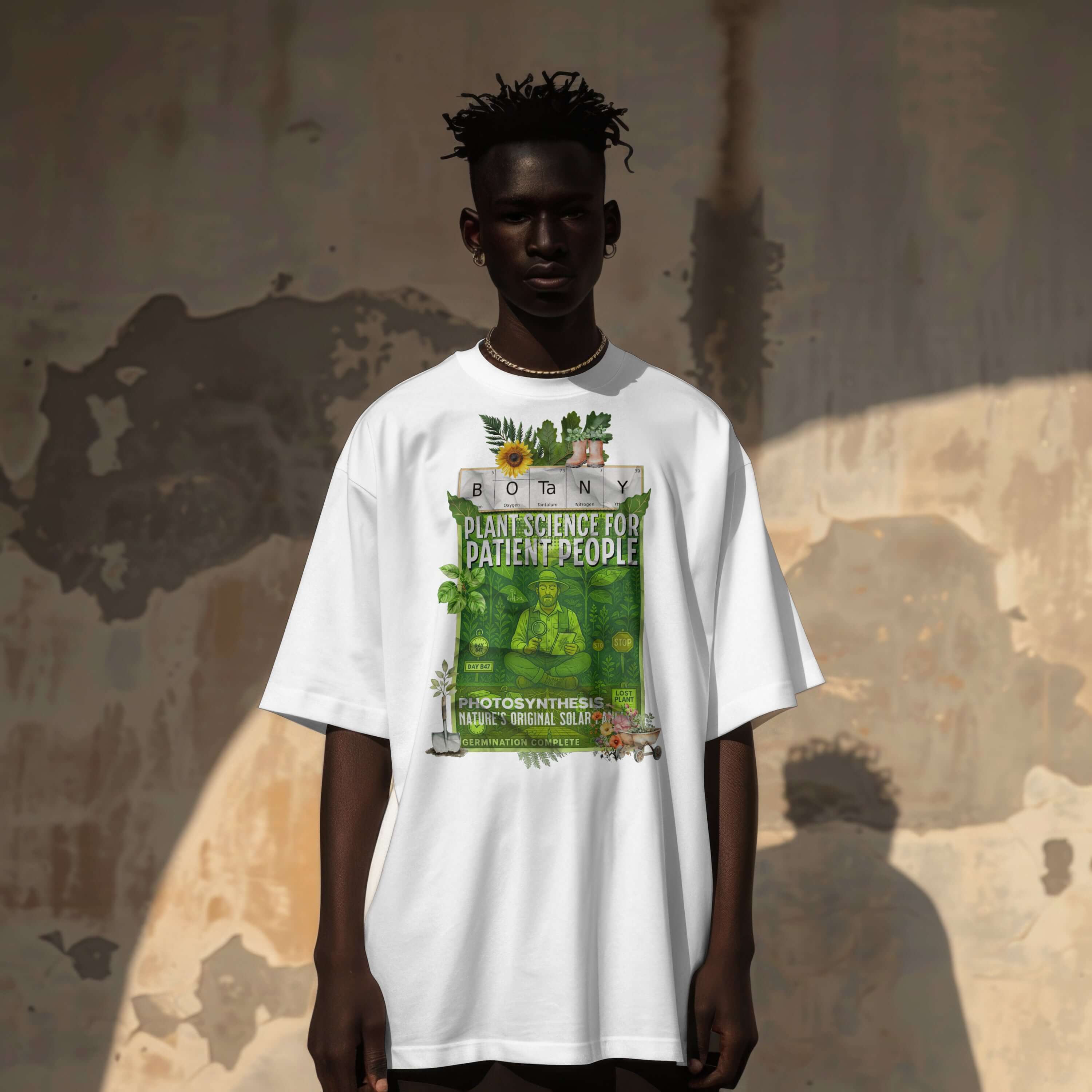 Person wearing a Botany T-shirt featuring plant science design on serene urban background.