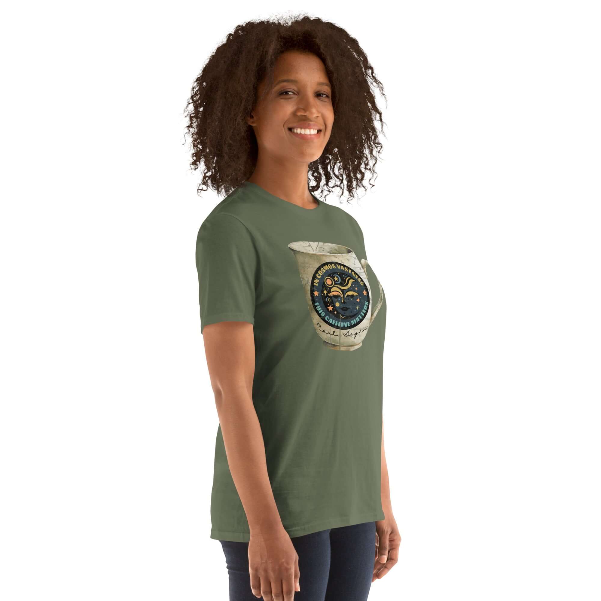 Woman wearing Carl Sagan Cosmic Coffee Mug T-Shirt with celestial design, cosmic swirls, stars, and planets. Astronomical caffeine humor.