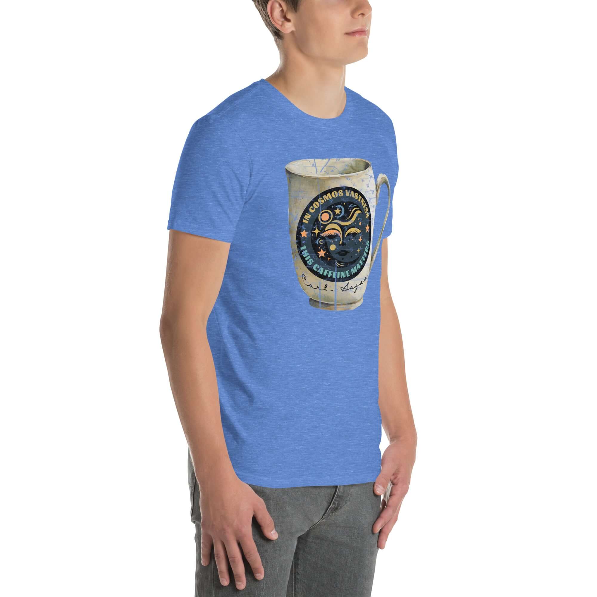 Man wearing a blue Carl Sagan Cosmic Coffee Mug T-Shirt with celestial designs and humorous caffeine message, perfect for space enthusiasts.