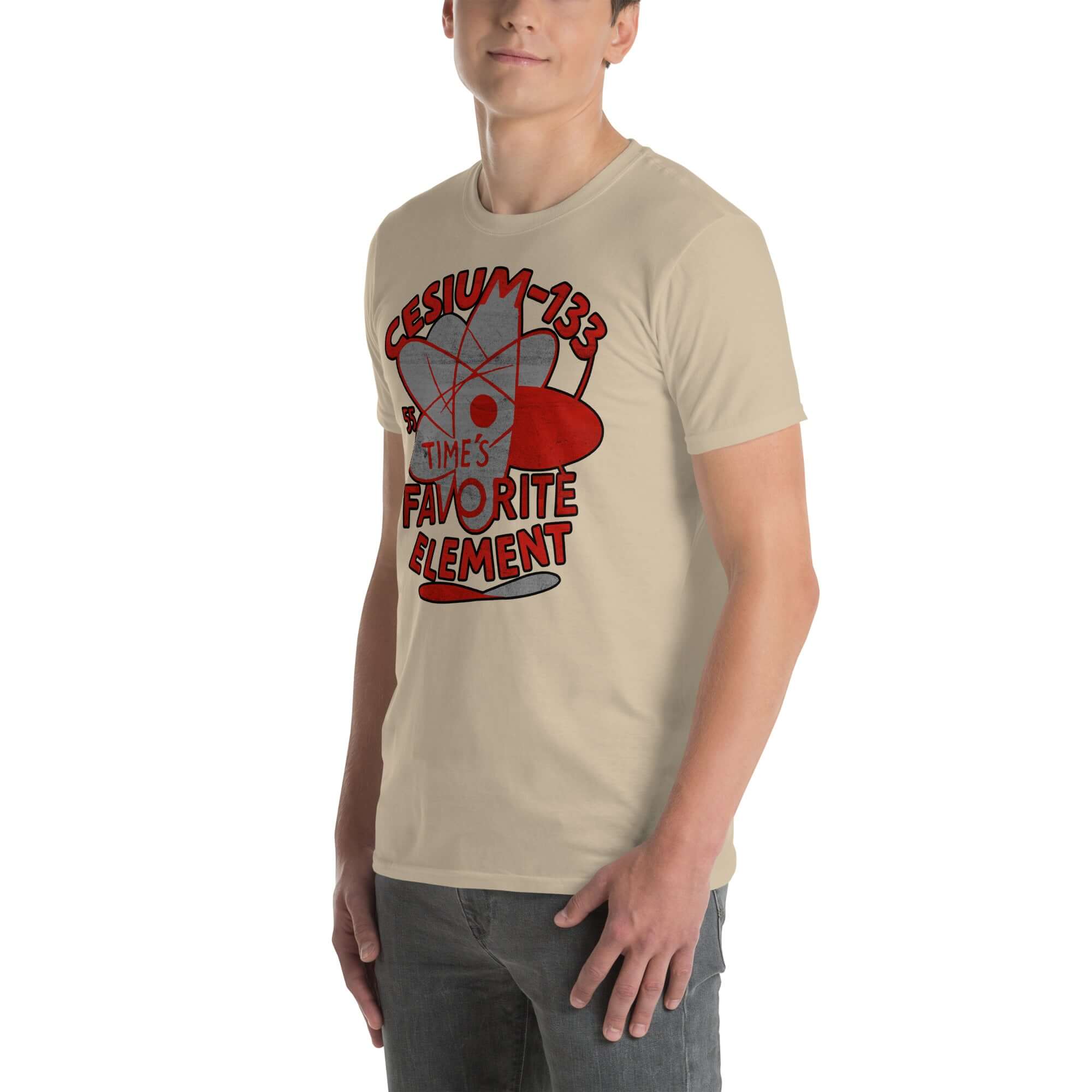 Cesium-133 Atomic Clock T-Shirt in beige with red design, featuring 'Time's Favorite Element' text.