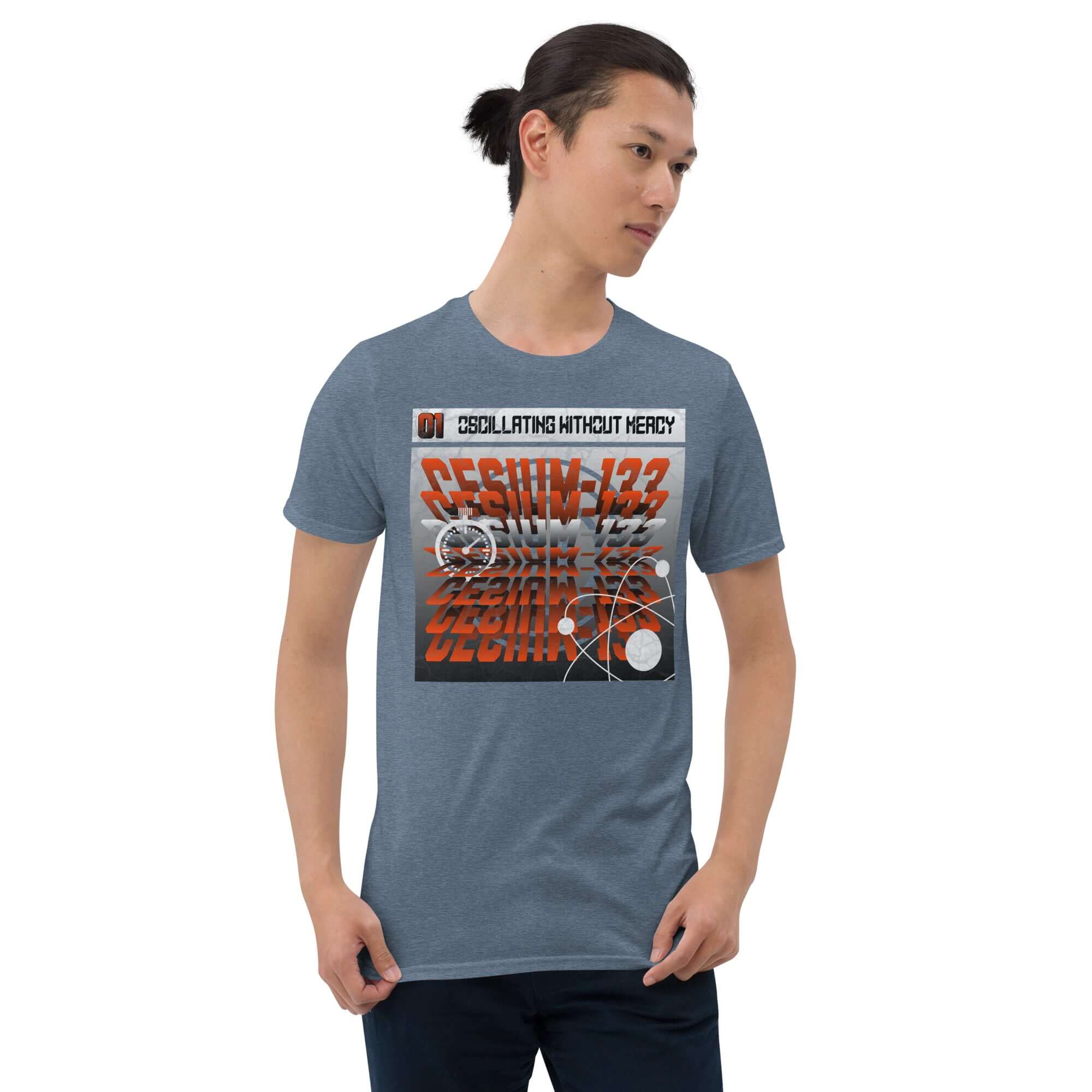 Man wearing Cesium-133 Oscillation T-shirt with industrial atomic clock design and bold typography.