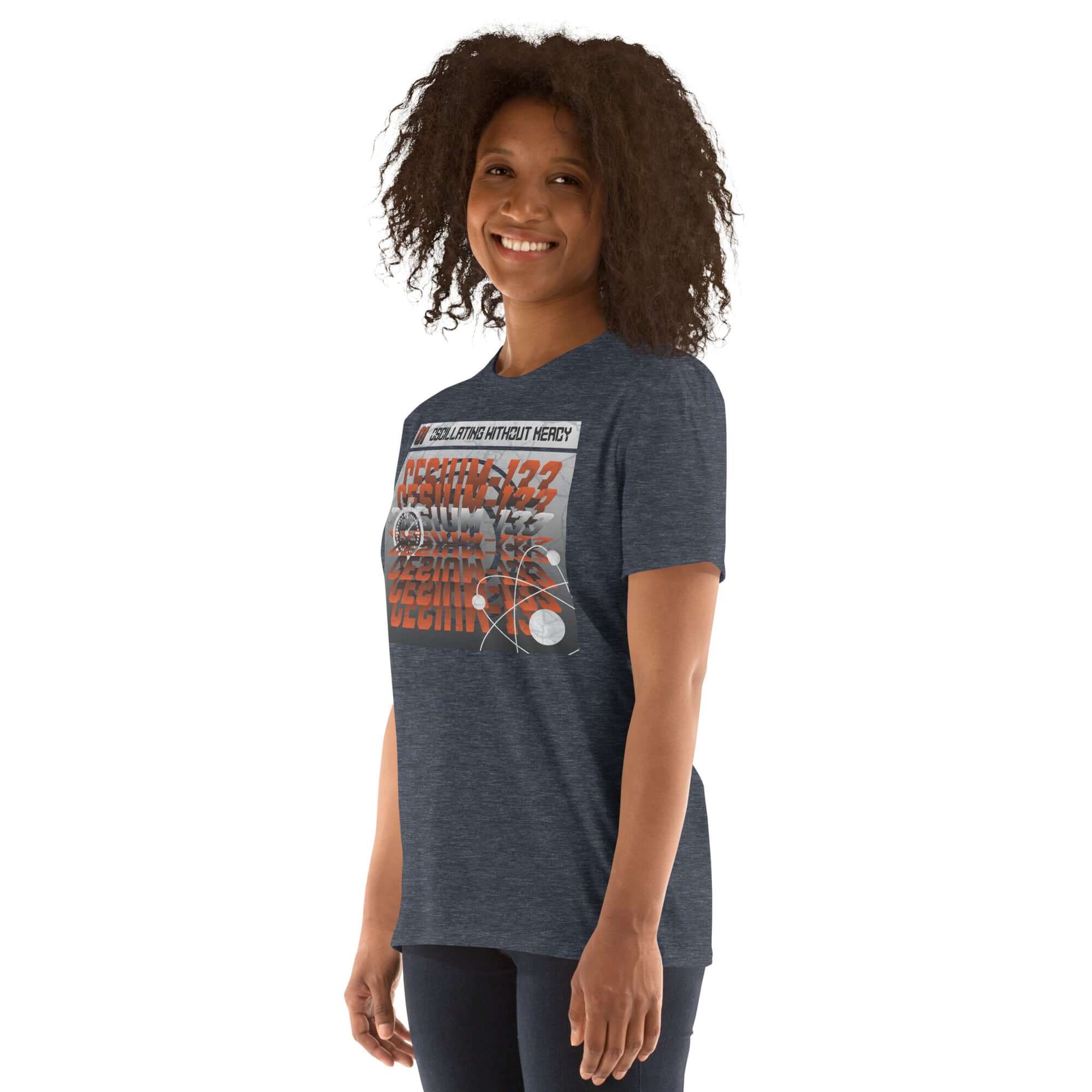 Person wearing a Cesium-133 Oscillation T-Shirt featuring atomic clock design and industrial minimalist typography.