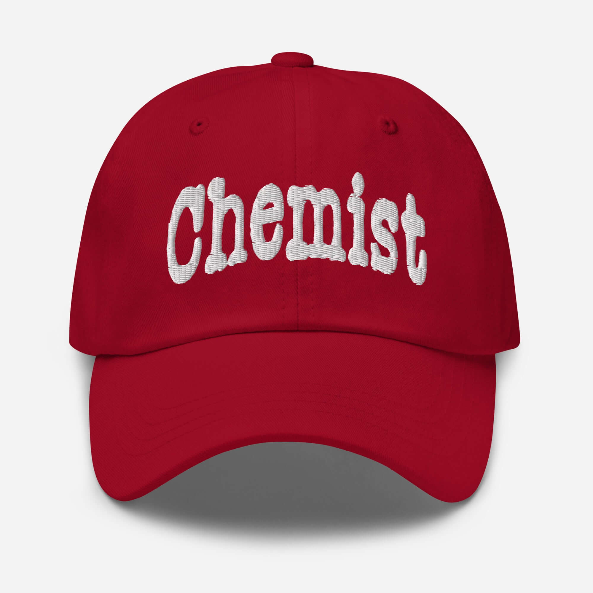 Red Chemist baseball cap with white embroidered "CHEMIST" text, ideal for professionals in chemistry and atom-wrangling roles.