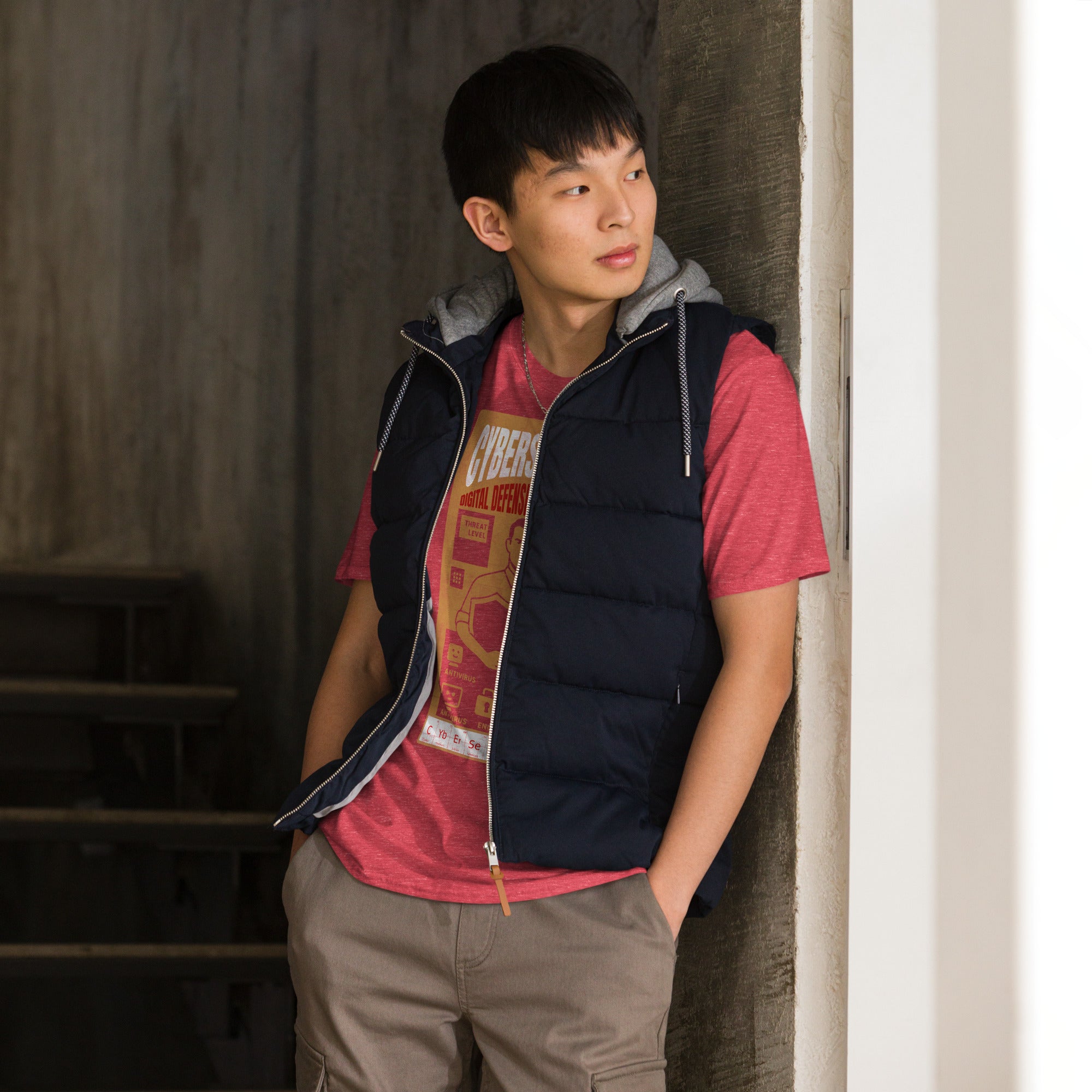 Person wearing a Cybersecurity T-shirt titled Digital Defense Against Human Stupidity, showcasing digital security theme in casual setting.