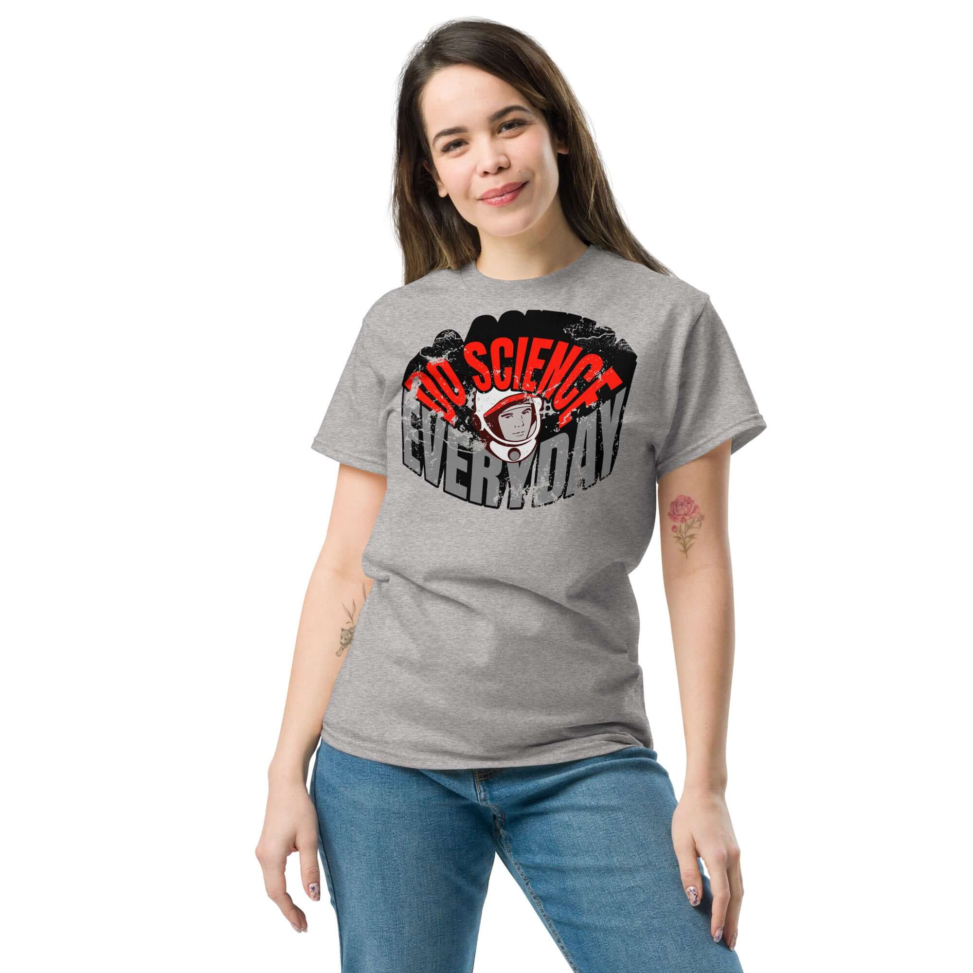 Woman wearing a 'Do Science Every Day' t-shirt featuring a retro astronaut design.