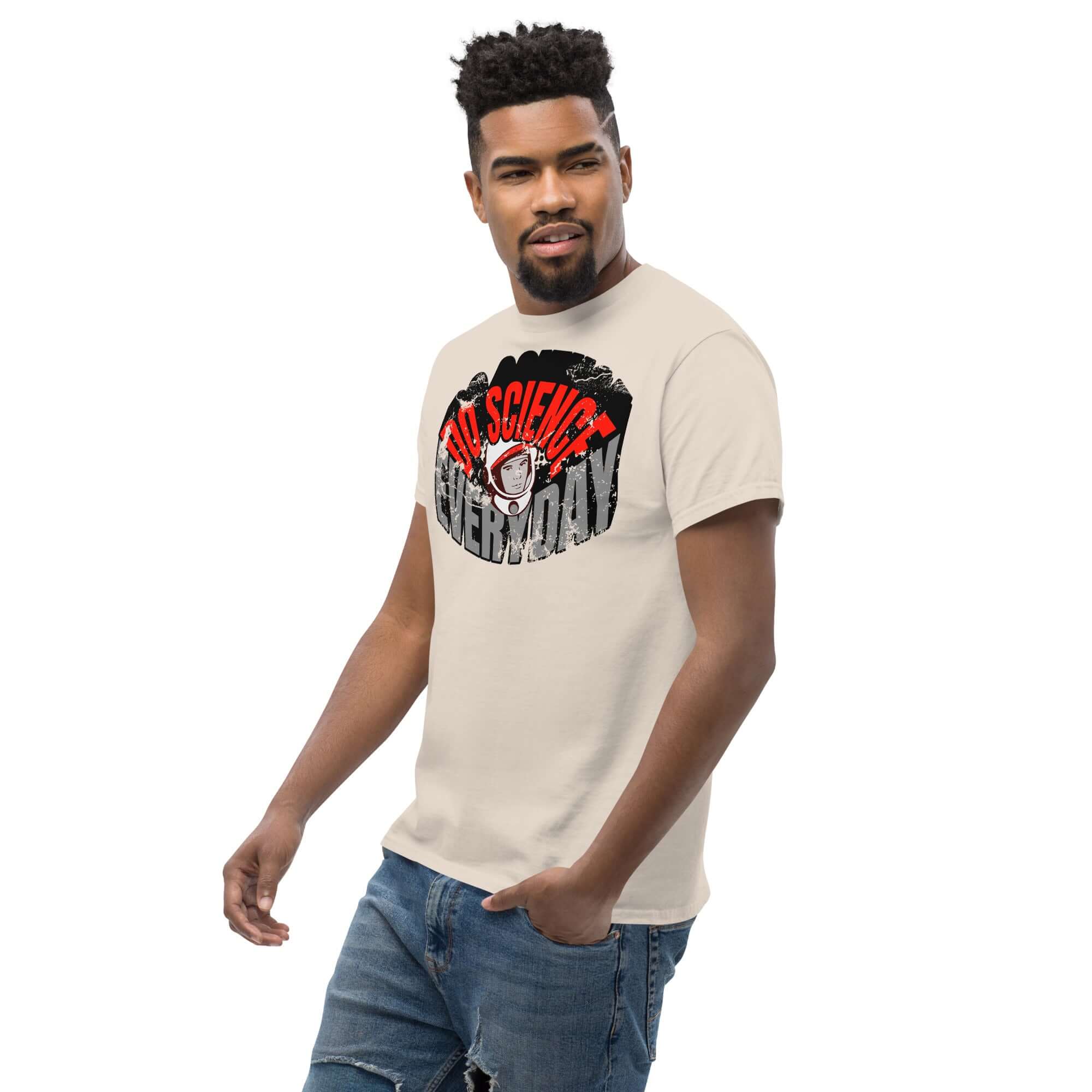 Man wearing 'Do Science Every Day' T-shirt with astronaut graphic, blending space exploration style and casual fashion.