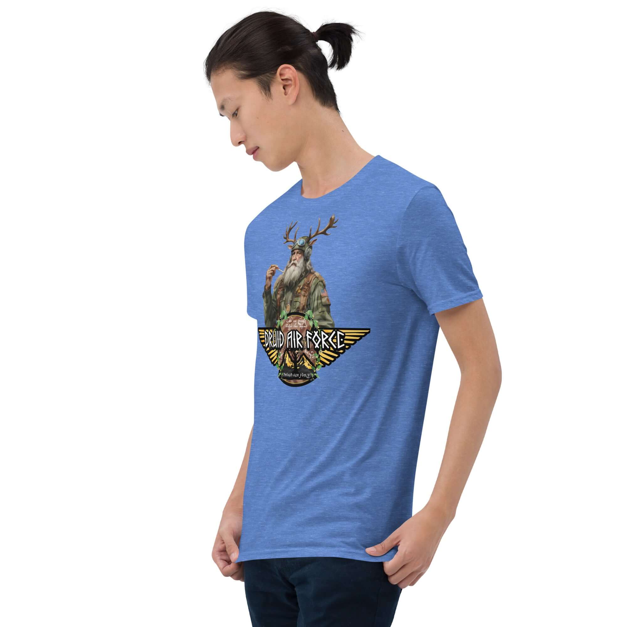Druid Air Force T-shirt featuring elder mystic with antlers and tactical gear on a sleek black background, model wearing blue.