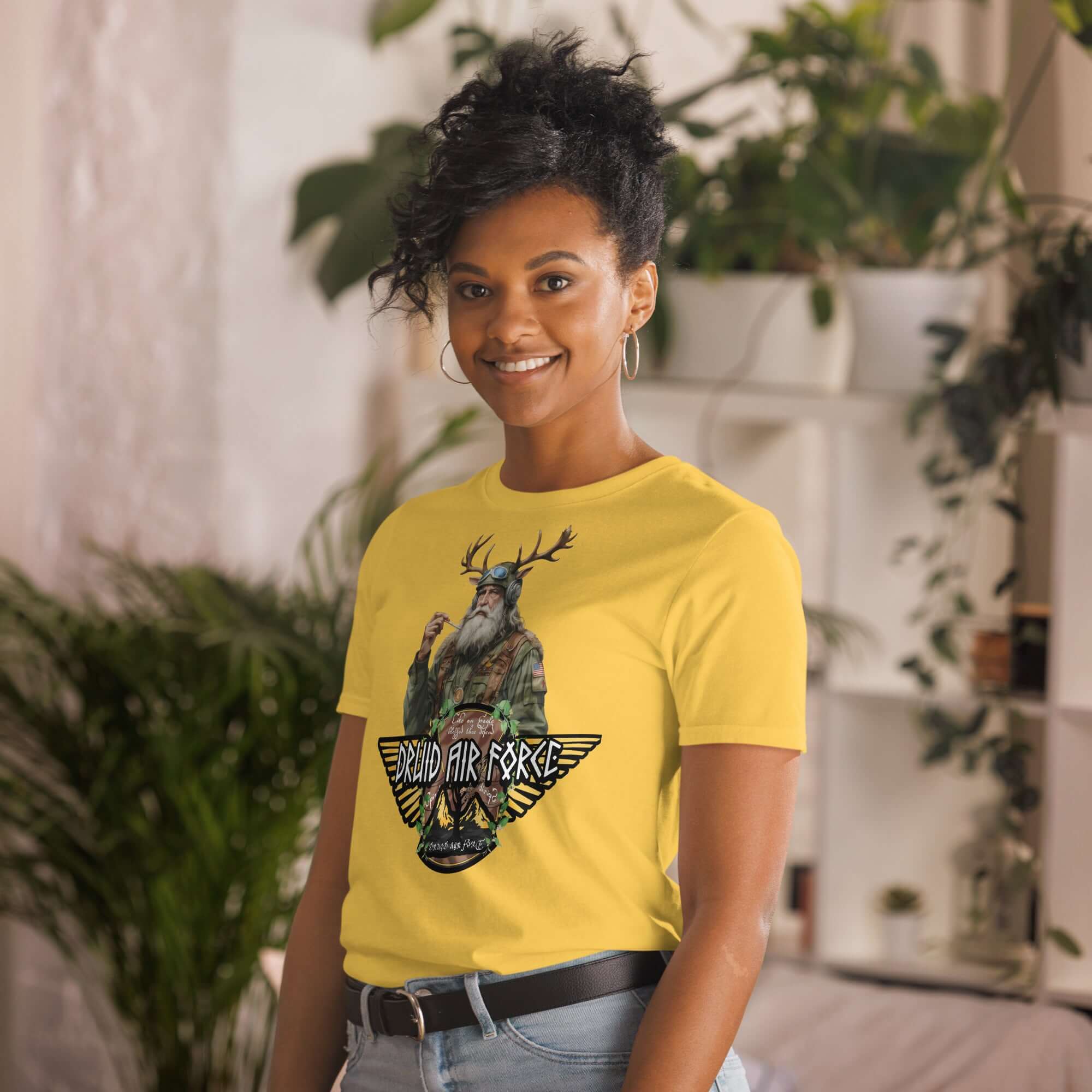 Woman wearing Druid Air Force T-shirt featuring a mystic with antlers and military gear, blending ancient magic with modern style.