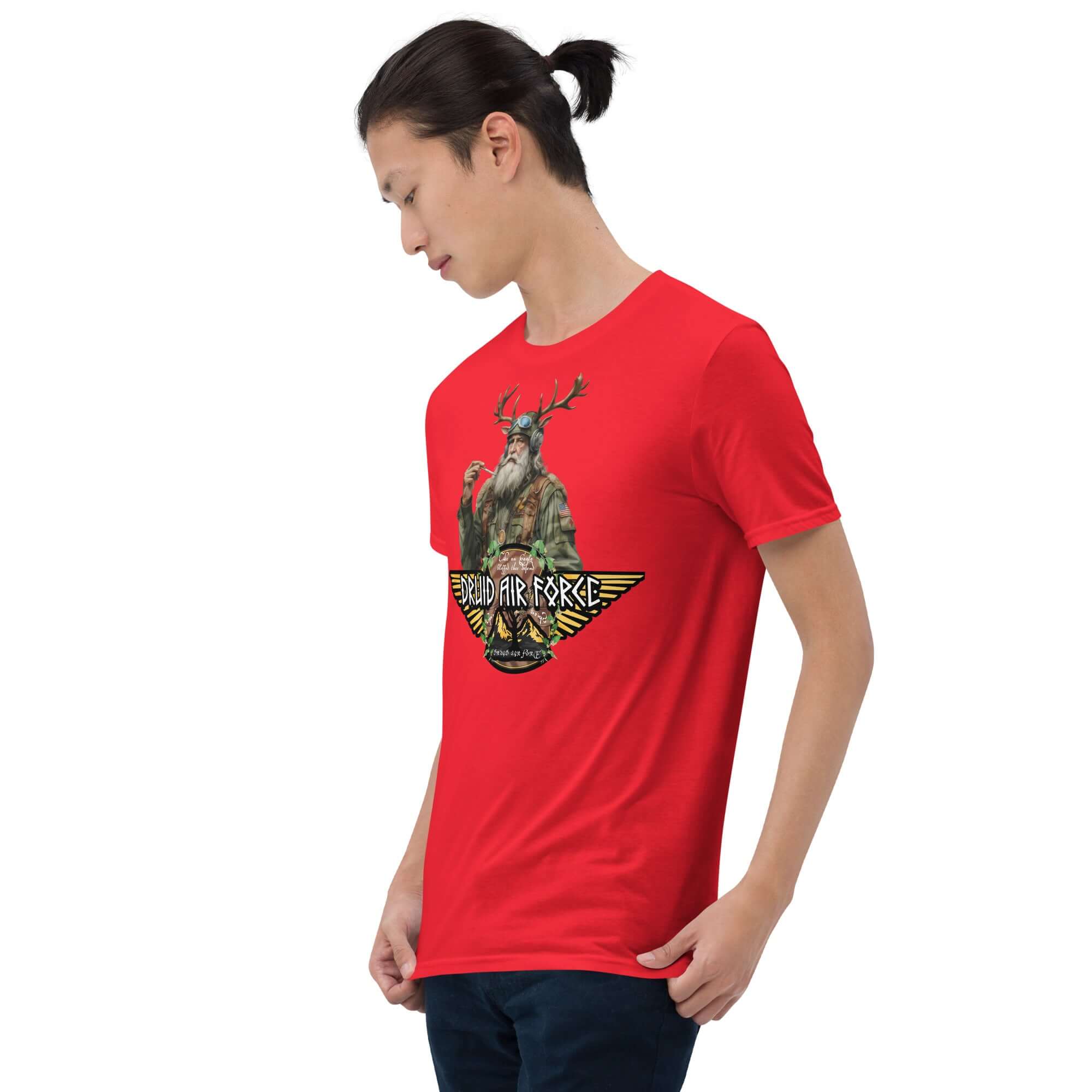 Person wearing red Druid Air Force T-shirt featuring elder mystic with antlers on sleek black background, blending ancient and modern styles.