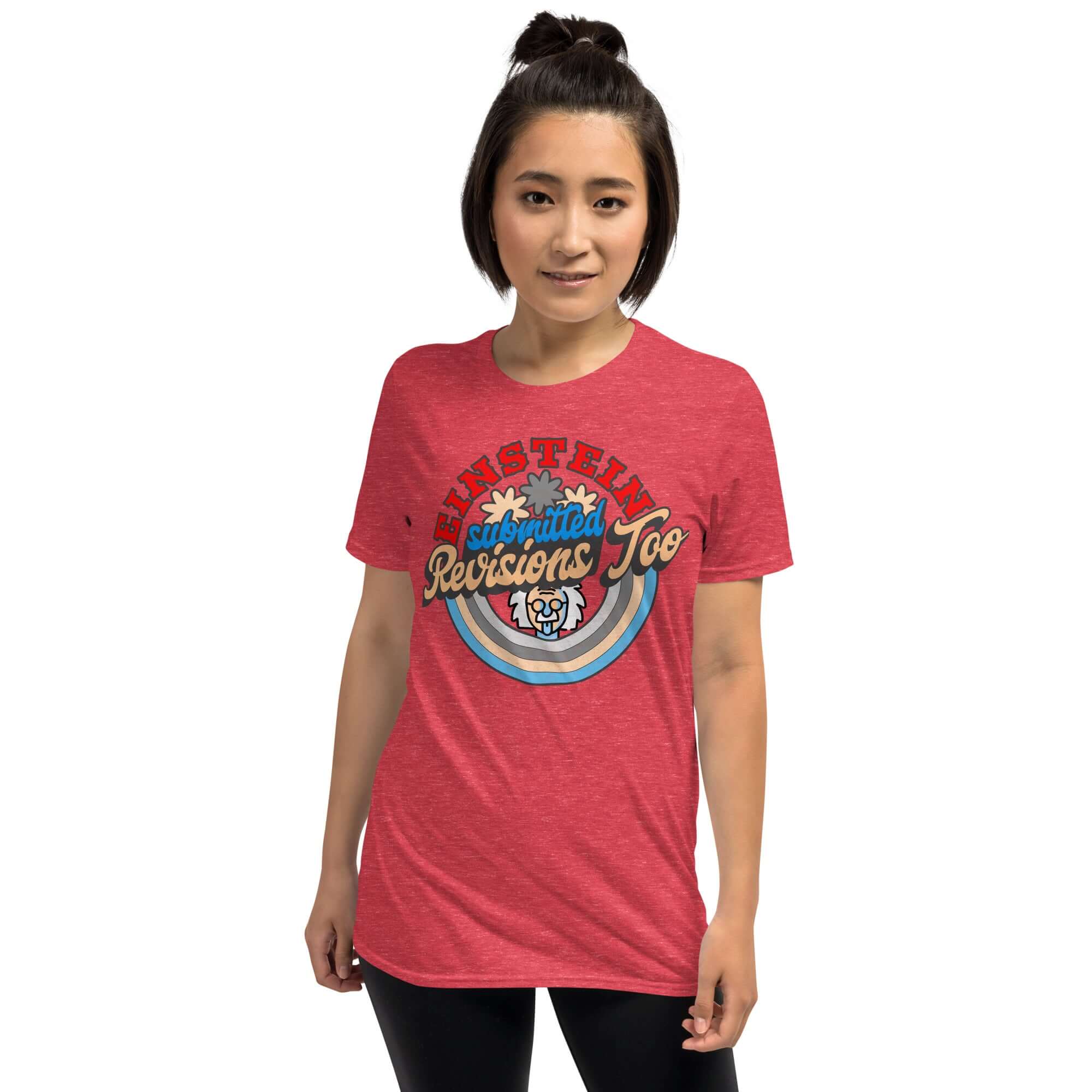Red t-shirt featuring 'Einstein Submitted Revisions Too' design with cartoon character, rainbows, and academic humor theme.