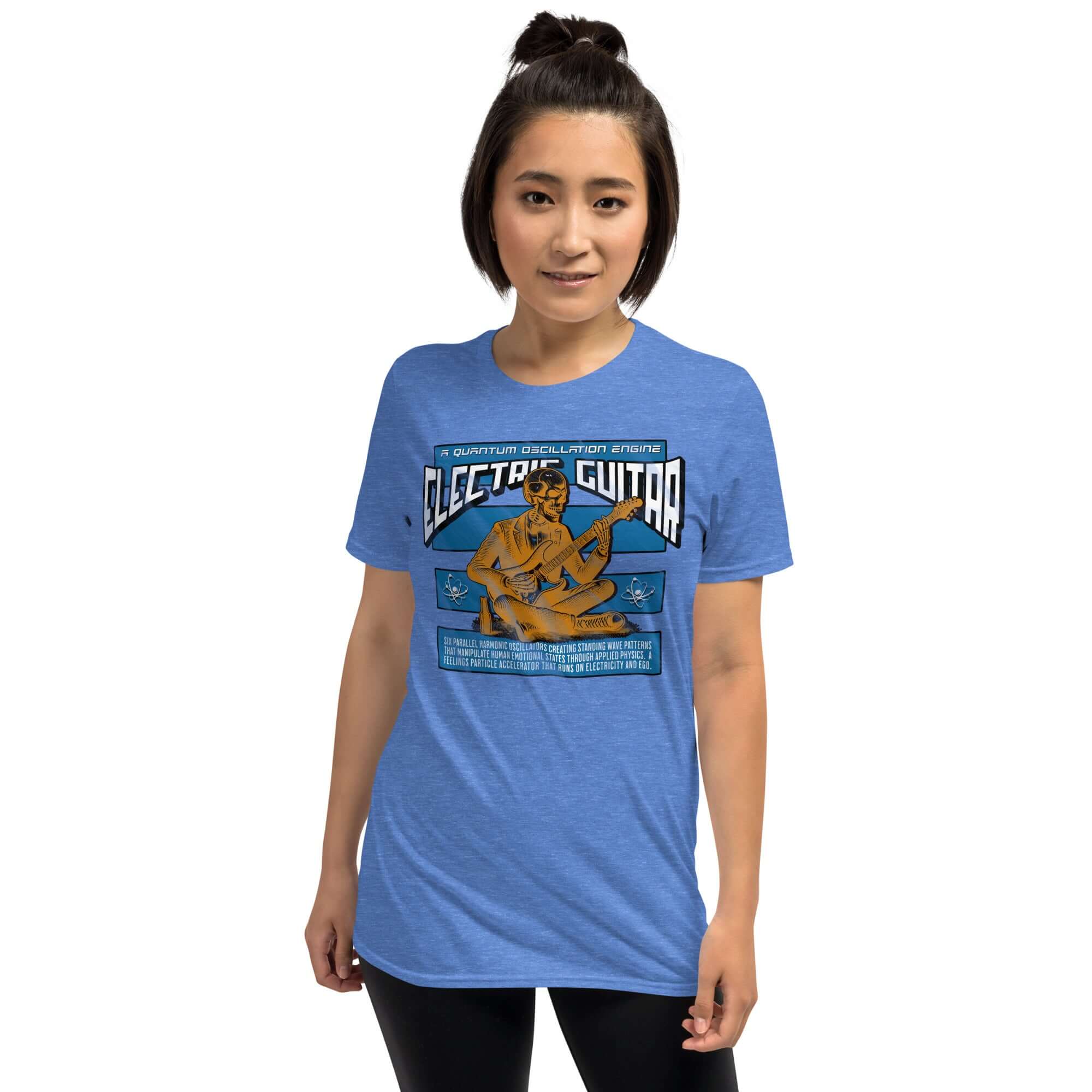 Woman wearing Electric Guitar Quantum Oscillation Engine T-Shirt, blue, featuring physics and music humor graphics.