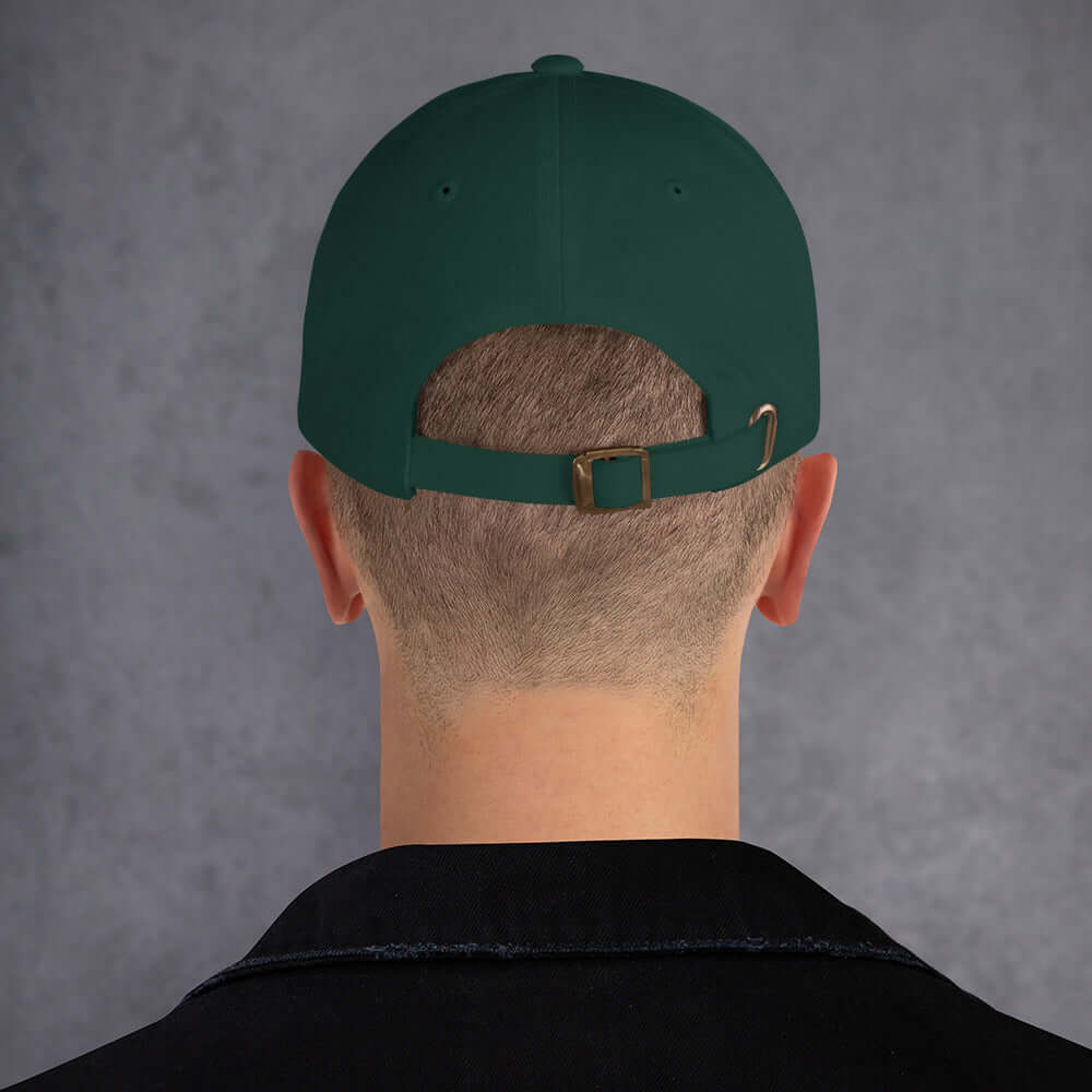 Back view of an "ENGINEER" baseball cap in green, showcasing adjustable strap for professional problem-solvers.