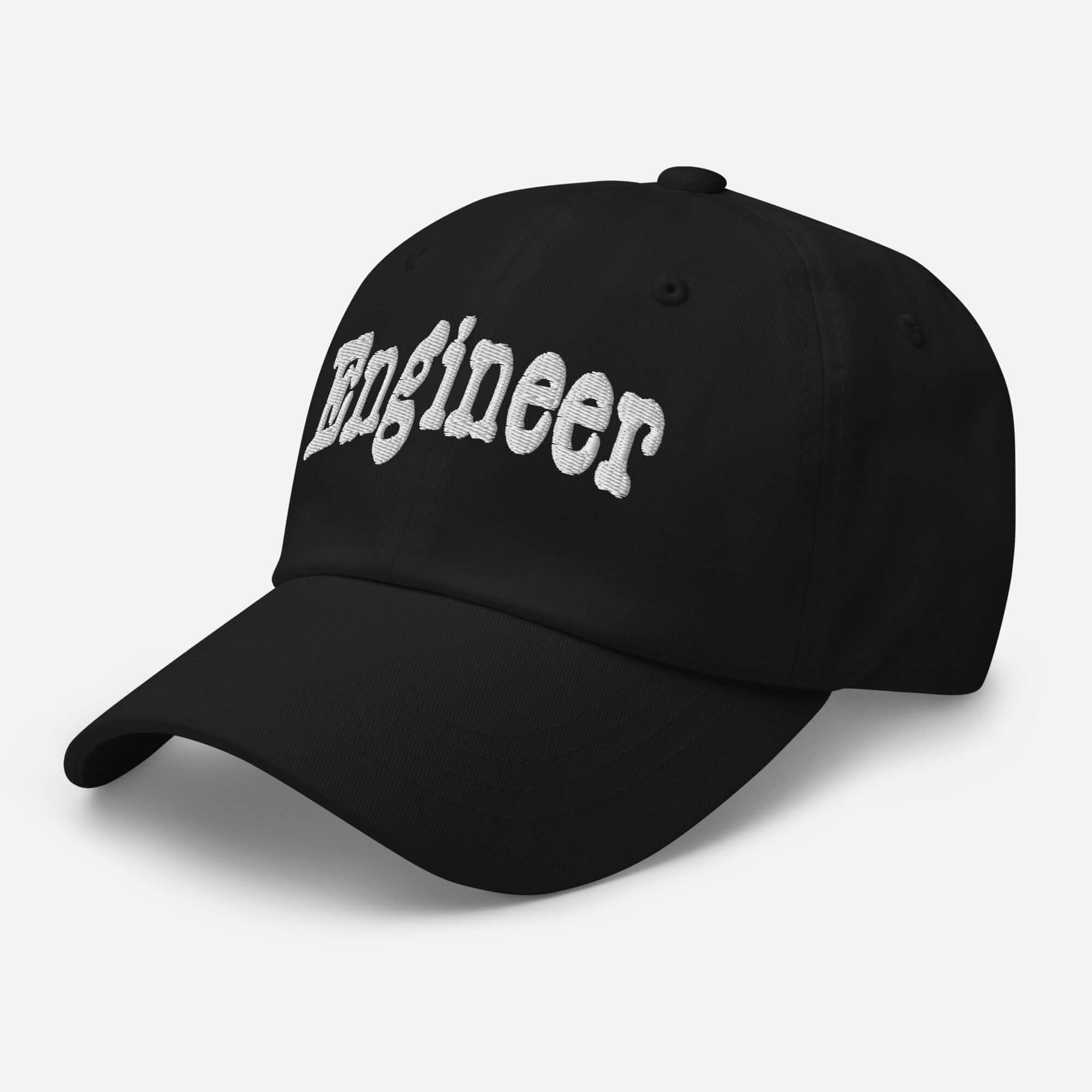 Black "ENGINEER" baseball cap for problem-solvers, featuring bold text and sleek design, ideal for professionals who fix the unbroken.