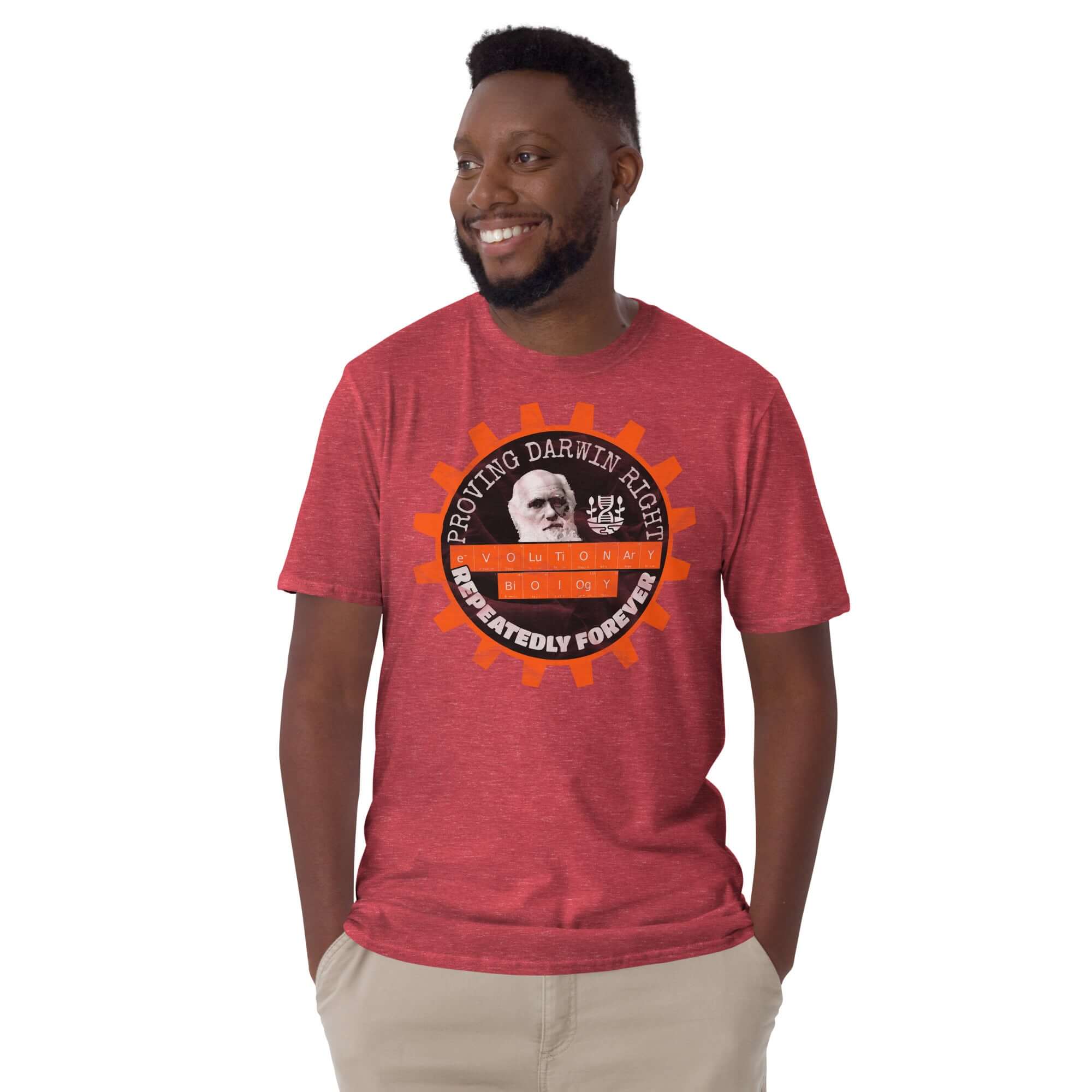 Man wearing a red Evolutionary Biology T-shirt with "Proving Darwin Right Repeatedly Forever" design featuring Darwin's image.