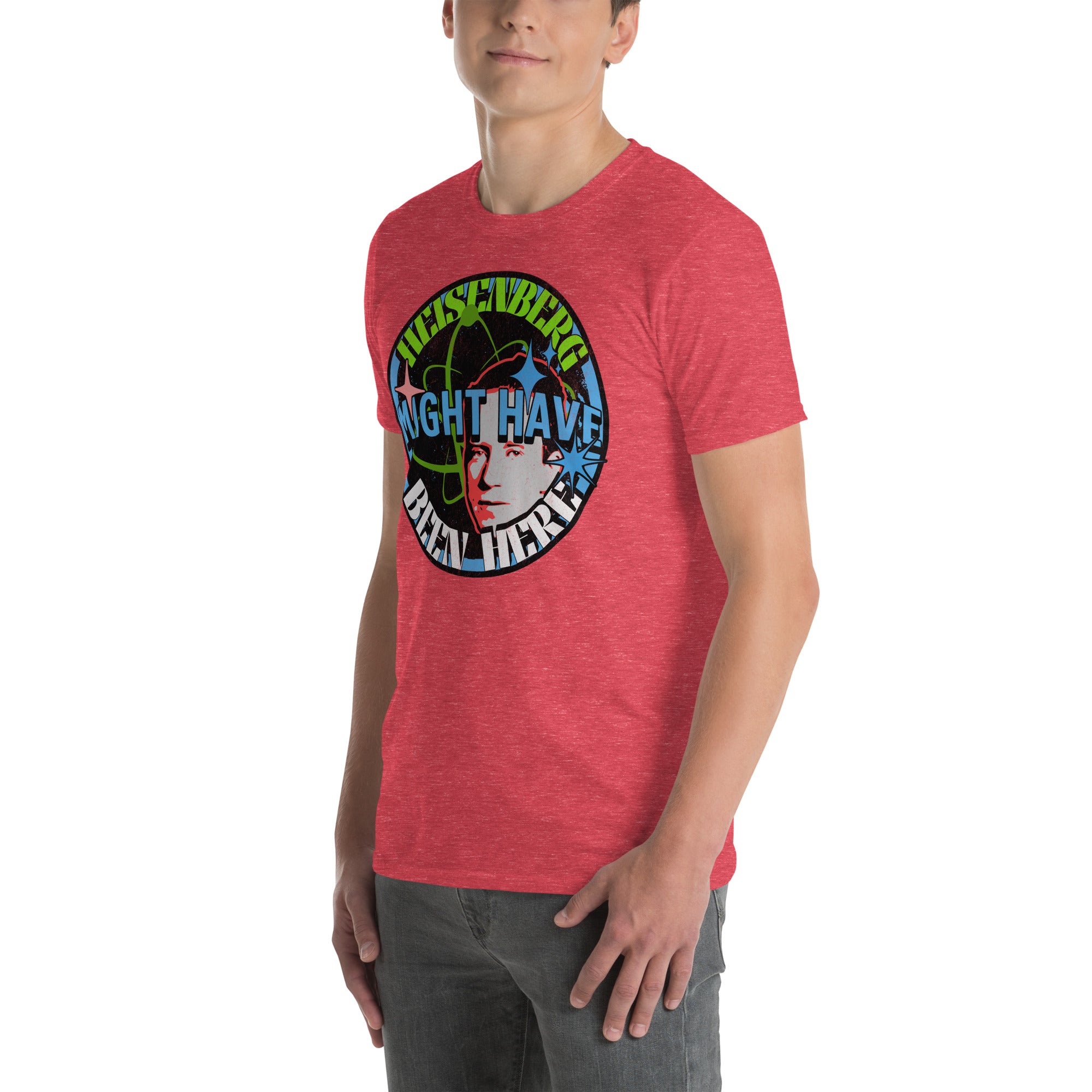 Red t-shirt with "Heisenberg Might Have Been Here" design featuring quantum physics humor and atomic symbols, worn by a model.