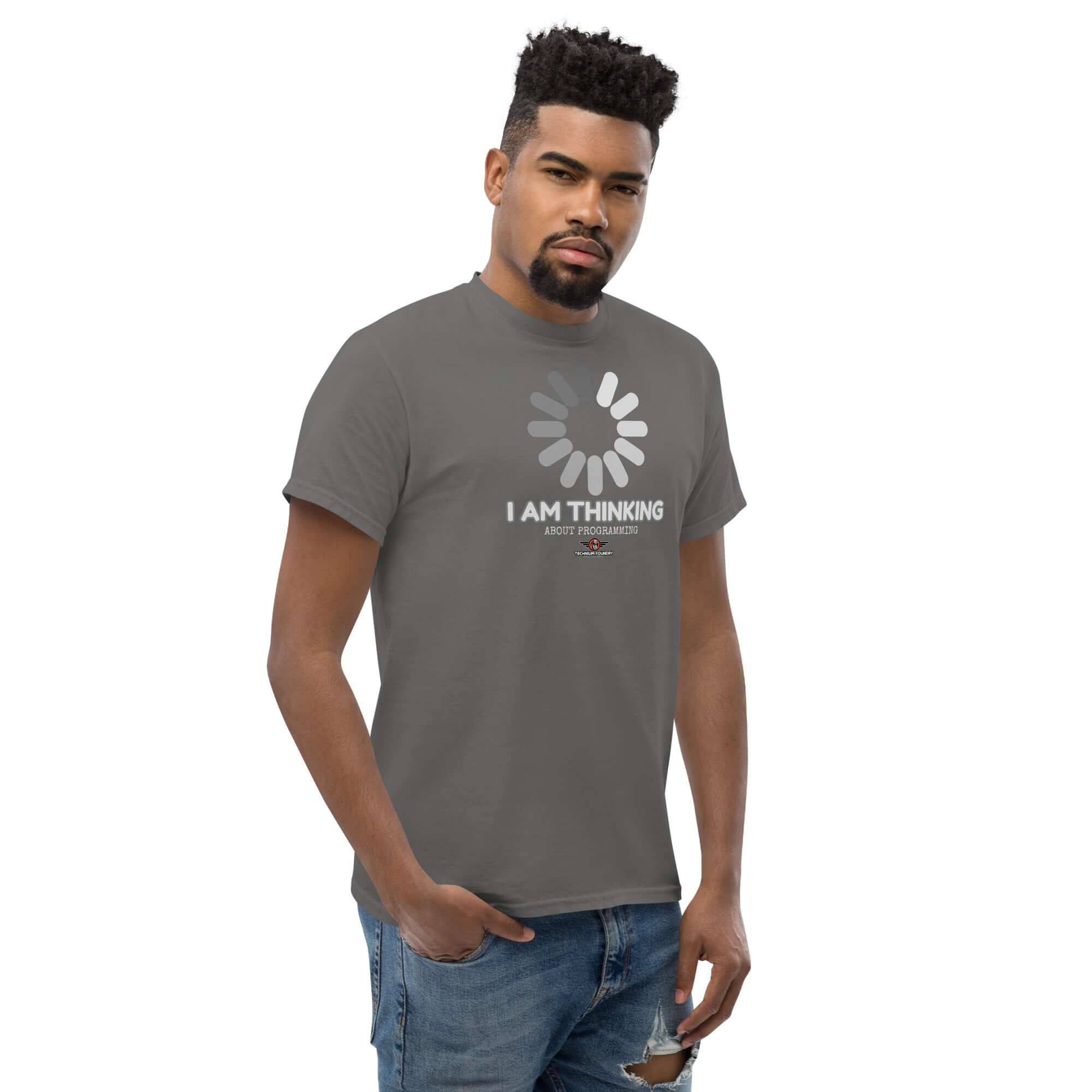 Man wearing 'I Am Thinking About Programming' t-shirt with loading screen graphic, symbolizing a buffering mind. Ideal for coders and programmers.