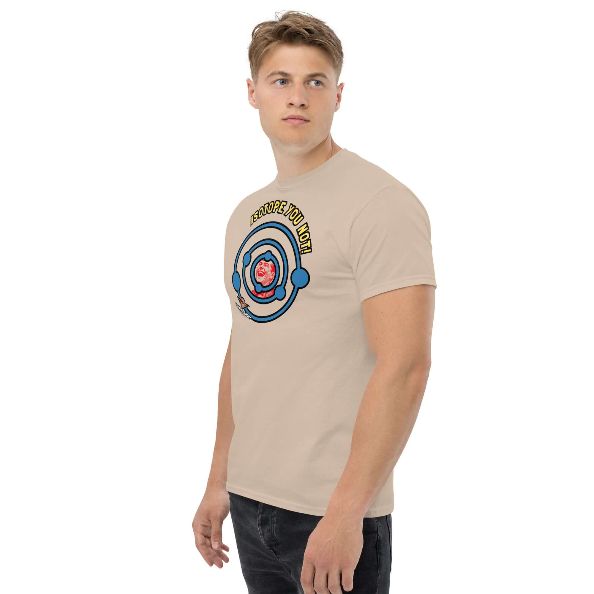 Man wearing "Isotope You Not!" nuclear chemistry pun t-shirt, featuring atomic design with electron shells, beige color, side view.