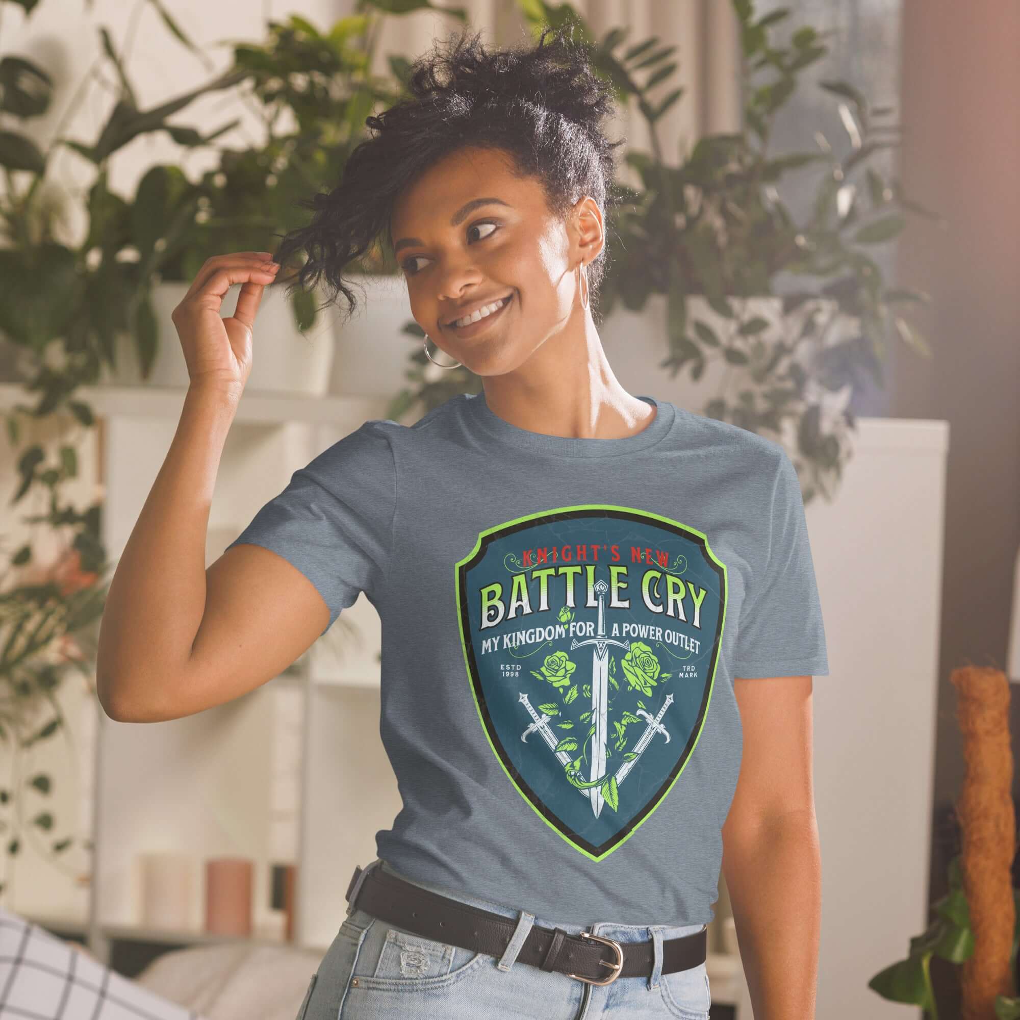 Woman wearing "Knight's New Battle Cry" t-shirt with medieval tech humor design featuring swords and roses.