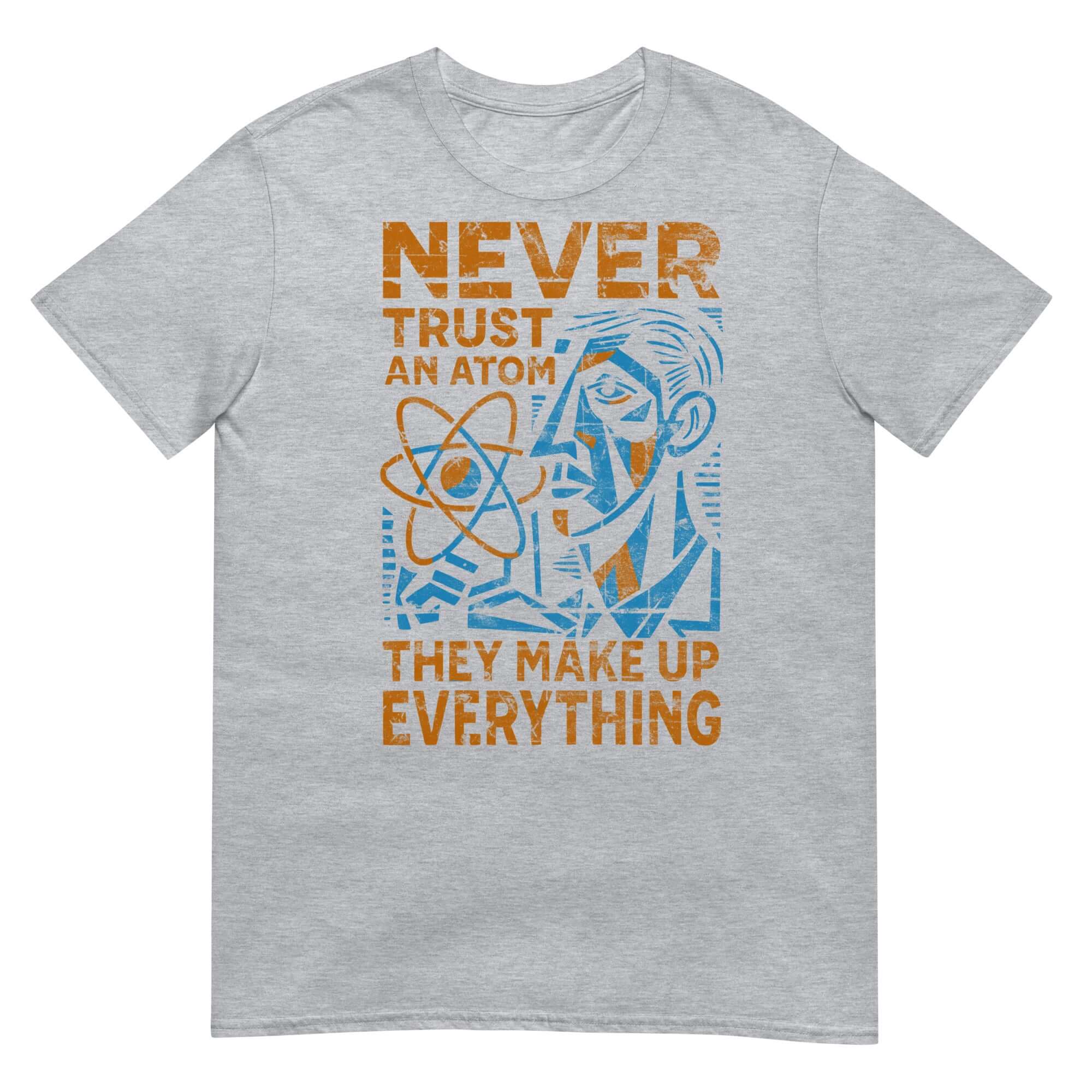 Never Trust an Atom cubist design T-shirt featuring geometric humor and modern physics paranoia slogan on gray fabric.