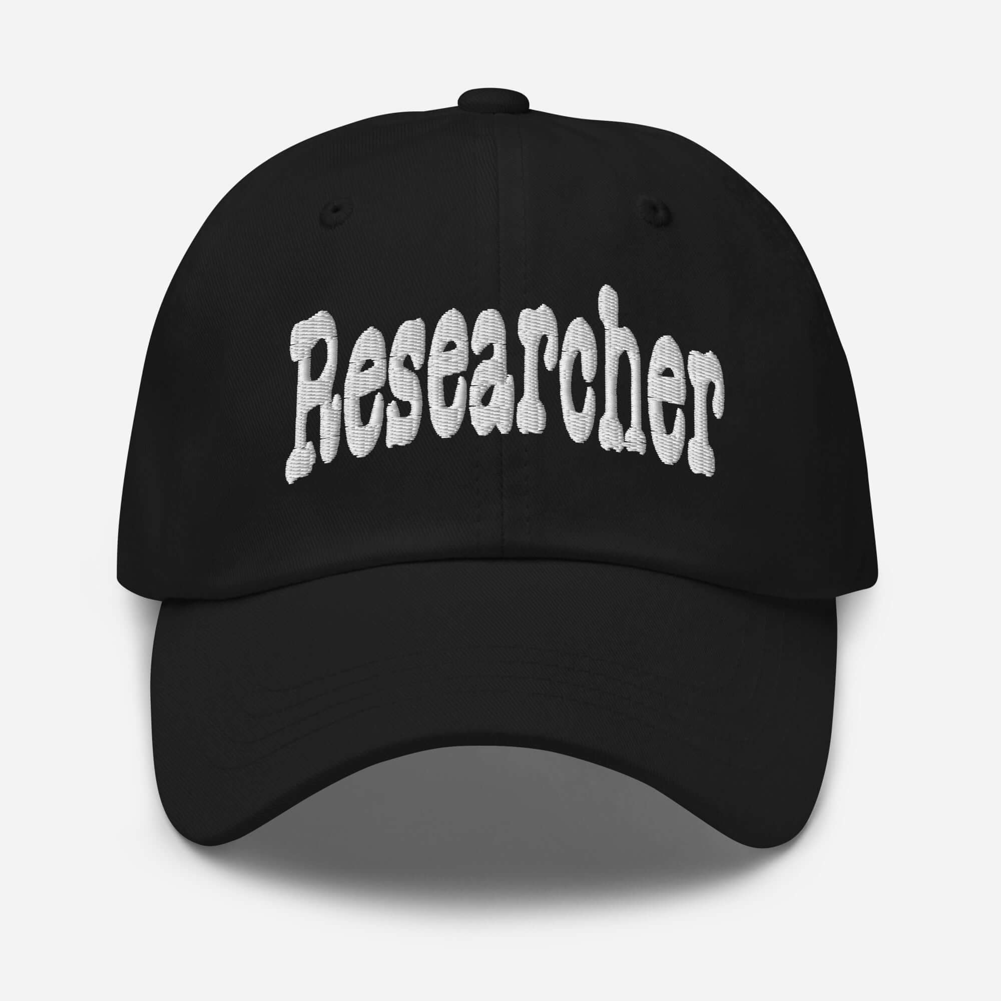 Black "Researcher" baseball cap - professional question-asking headwear for researchers, featuring bold white lettering.