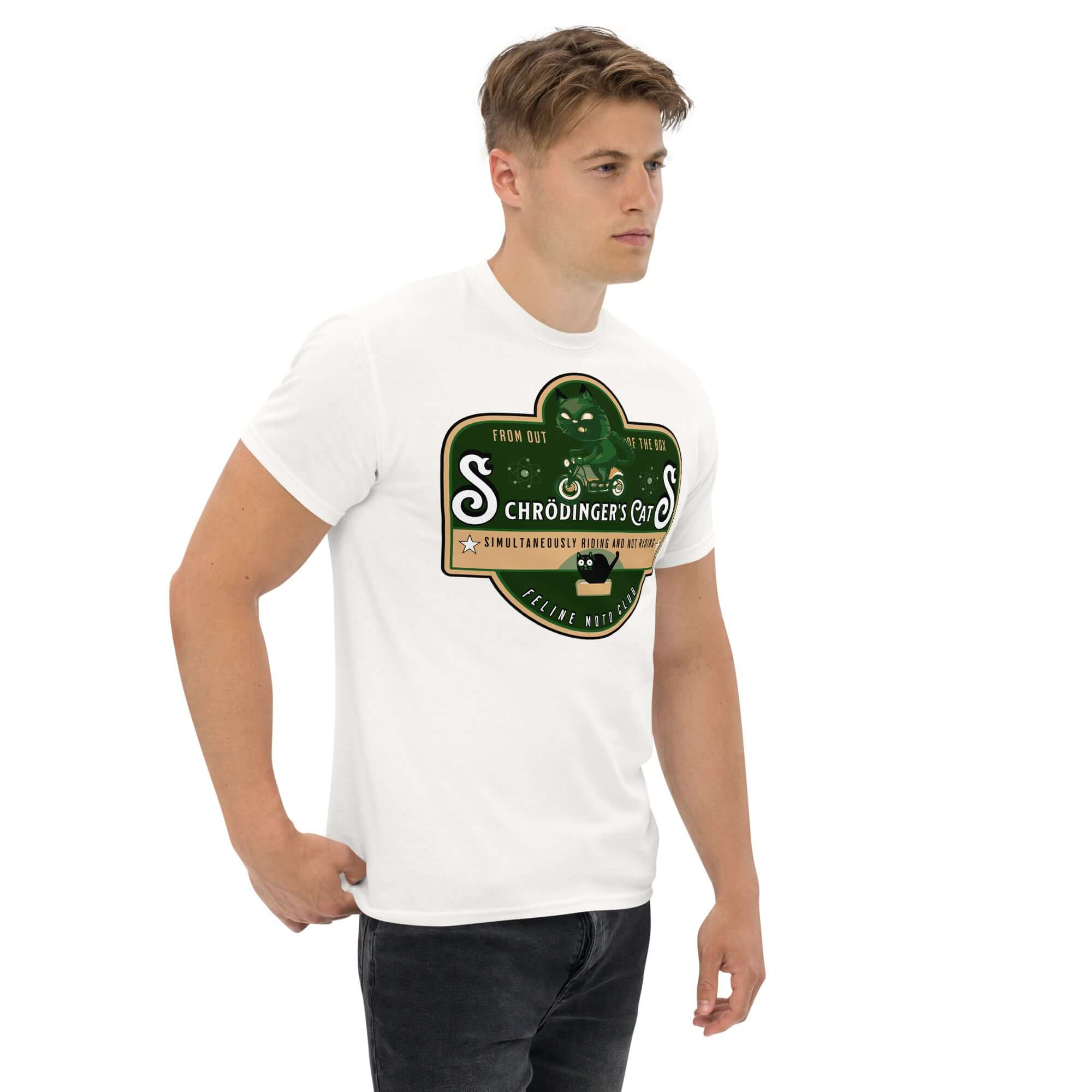 Man wearing Schrödinger's Cats Motorcycle Club T-Shirt with green cat emblem, merging quantum physics and biker style.