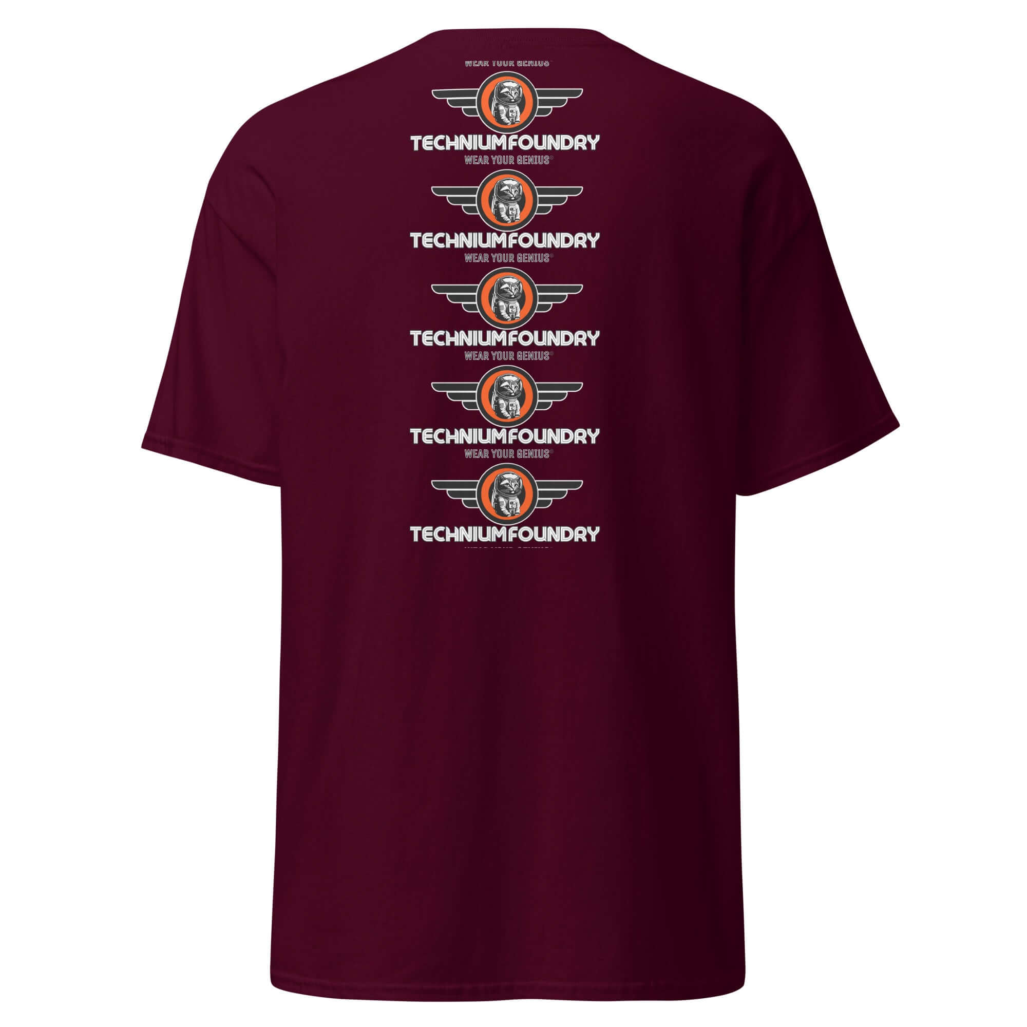 Back of burgundy t-shirt with "Technium Foundry" logo and text design in white and orange, featuring multiple rows.