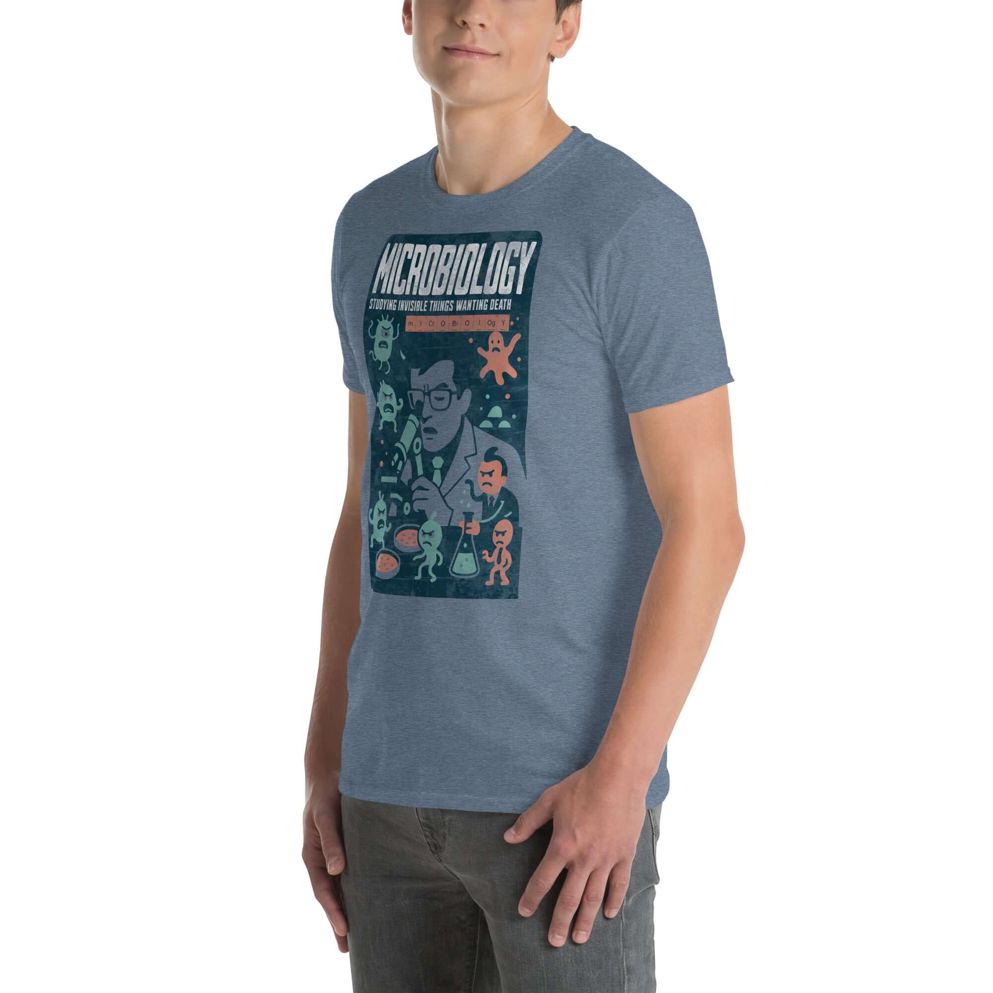 Man wearing a blue Microbiology T-Shirt with 'Studying Invisible Things Wanting Death' graphic design.