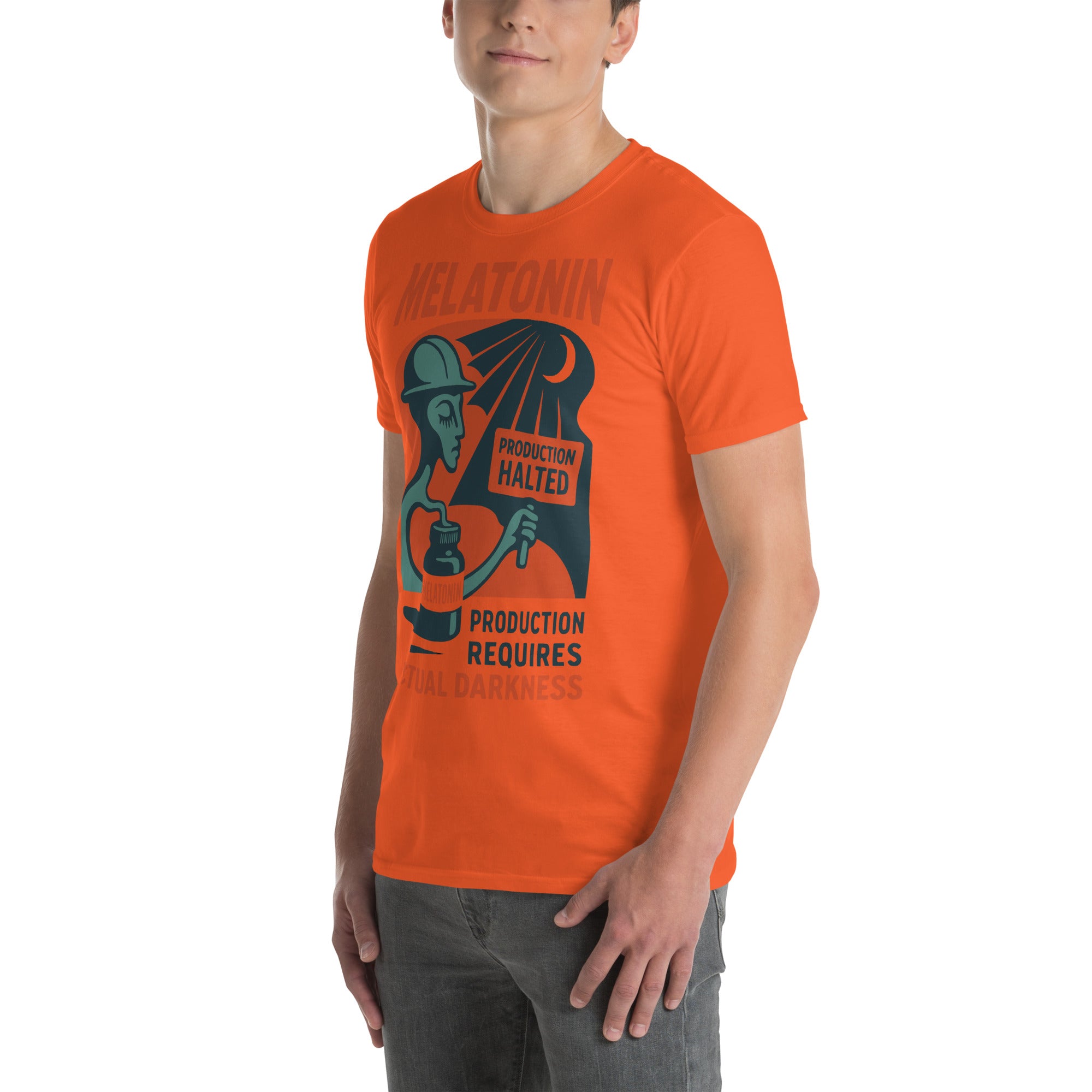 Orange Melatonin T-shirt with 'Production Requires Actual Darkness' design, celebrating the industrial sleep complex.