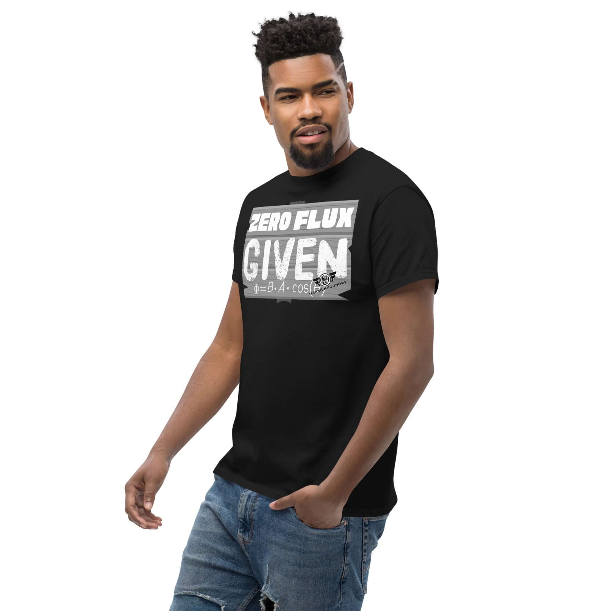 Man wearing 'Zero Flux Given' physics t-shirt with magnetic field equation in chalkboard style.